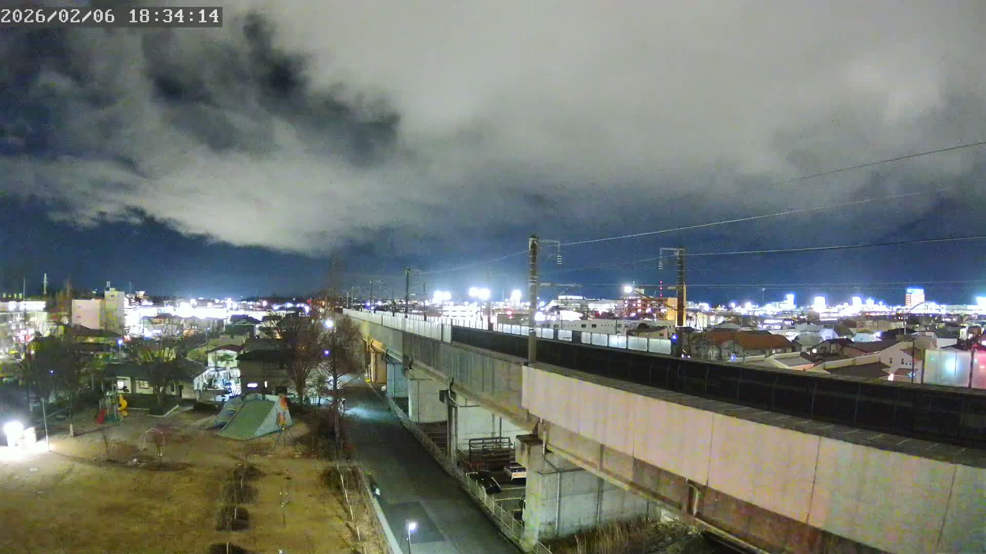Koriyama City Skyline & Tonoku / Akita Shinkansen ( Bullet Train ) Viaduct ( 郡山市街のスカイラインと東濃・秋田新幹線高架橋 ) Live Cam - 2 Chome, Asakamachi Hidenoyama, Koriyama, Fukuşima, Tōhoku, Honshu, Japan