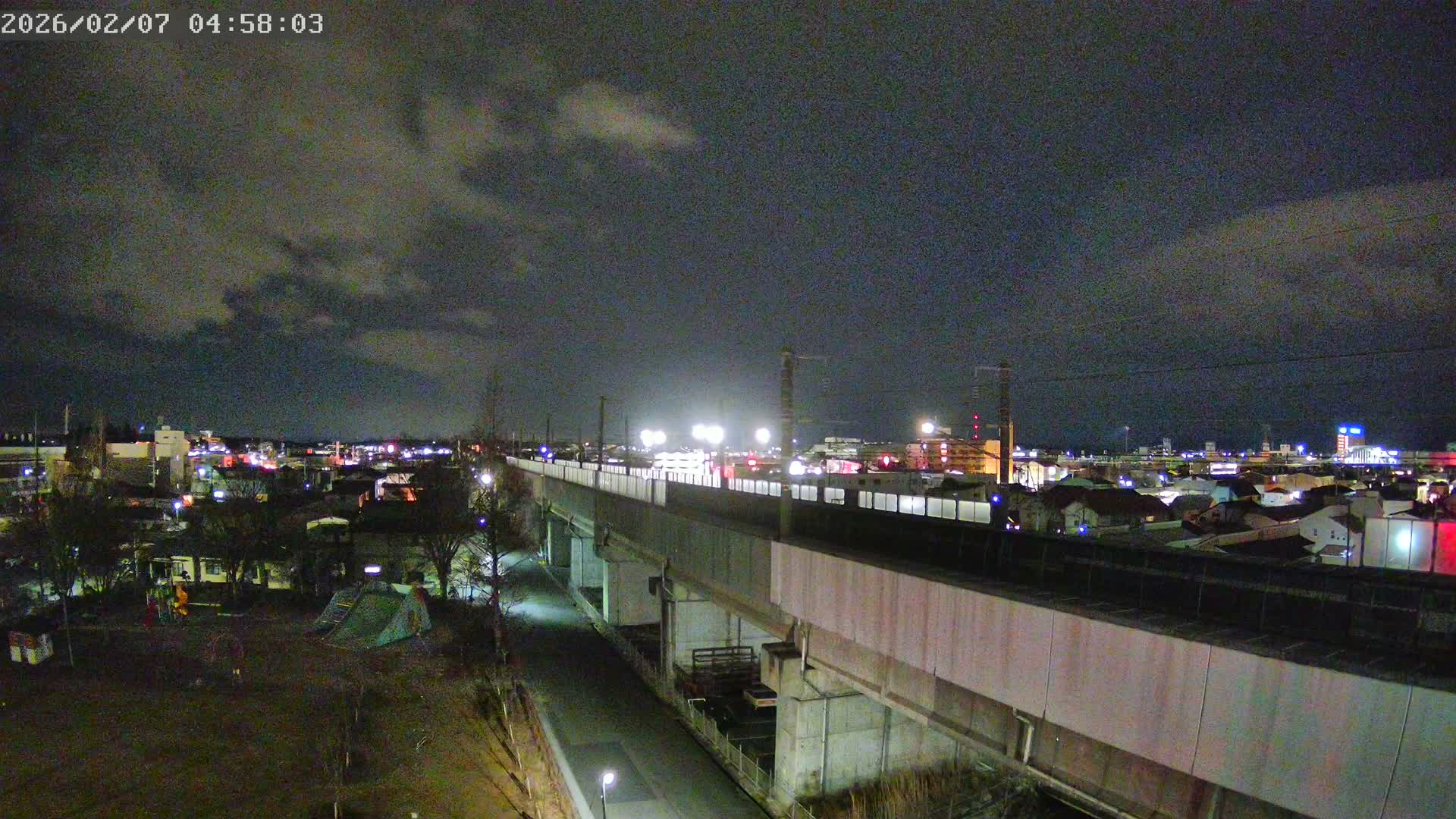 Koriyama City Skyline & Tonoku / Akita Shinkansen ( Bullet Train ) Viaduct ( 郡山市街のスカイラインと東濃・秋田新幹線高架橋 ) Live Cam - 2 Chome, Asakamachi Hidenoyama, Koriyama, Fukuşima, Tōhoku, Honshu, Japan