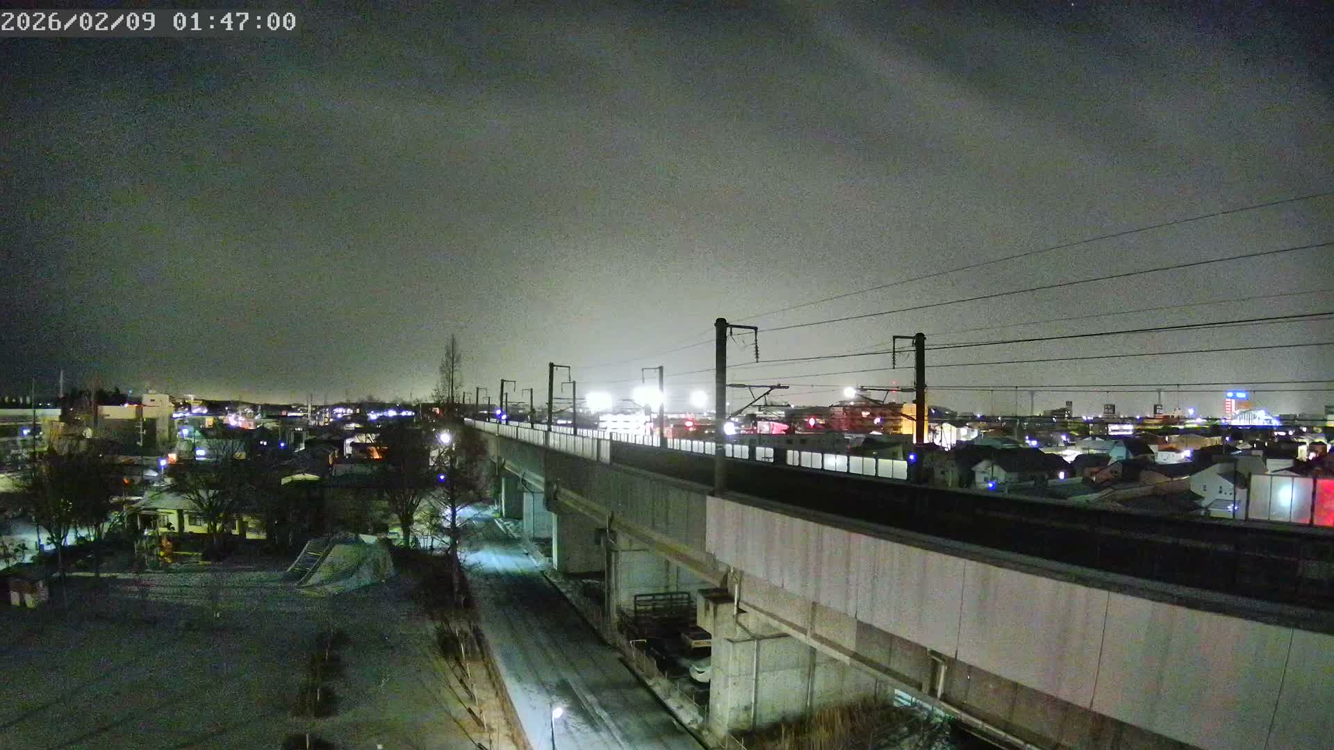 Koriyama City Skyline & Tonoku / Akita Shinkansen ( Bullet Train ) Viaduct ( 郡山市街のスカイラインと東濃・秋田新幹線高架橋 ) Live Cam - 2 Chome, Asakamachi Hidenoyama, Koriyama, Fukuşima, Tōhoku, Honshu, Japan