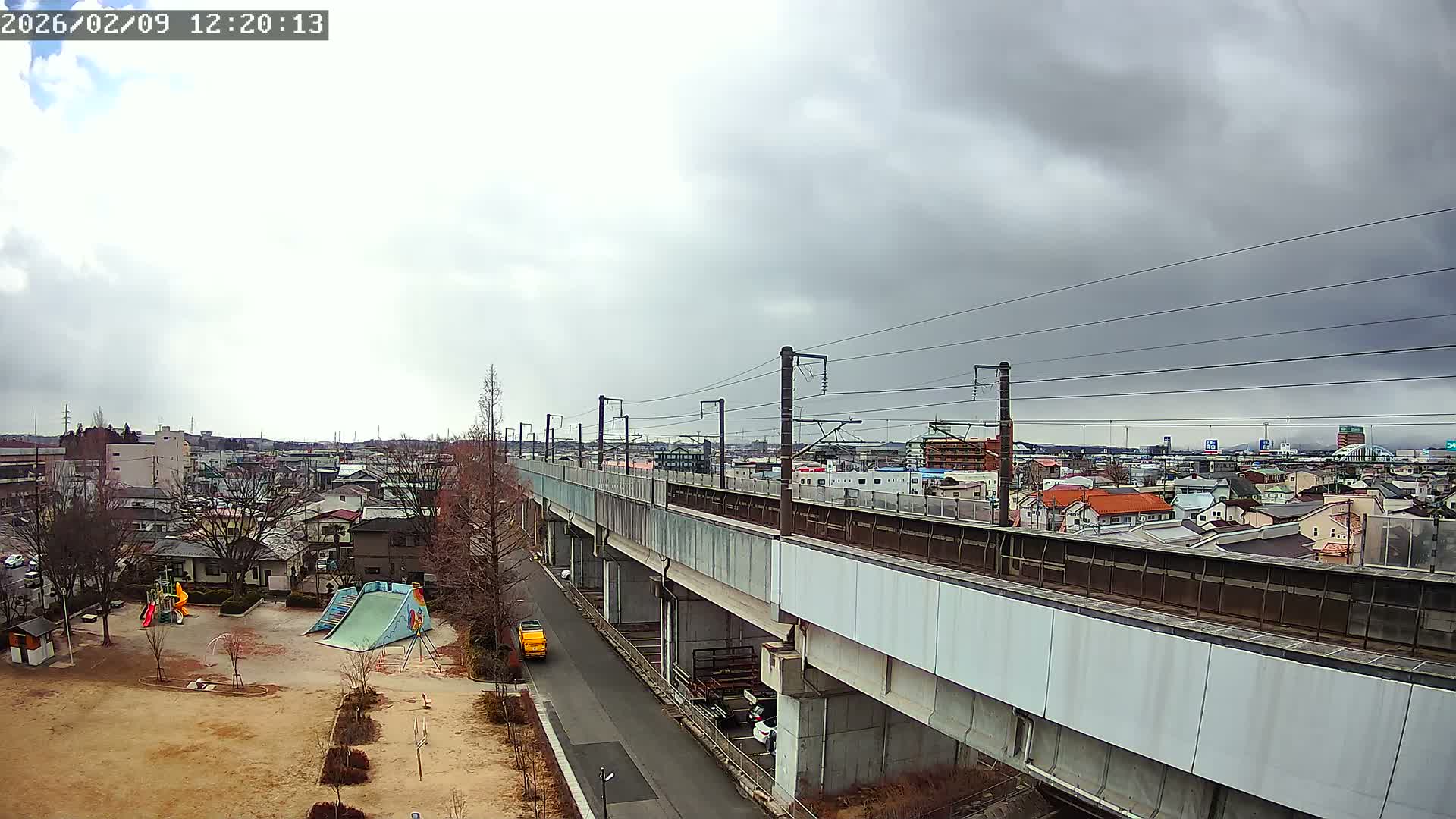 Koriyama City Skyline & Tonoku / Akita Shinkansen ( Bullet Train ) Viaduct ( 郡山市街のスカイラインと東濃・秋田新幹線高架橋 ) Live Cam - 2 Chome, Asakamachi Hidenoyama, Koriyama, Fukuşima, Tōhoku, Honshu, Japan