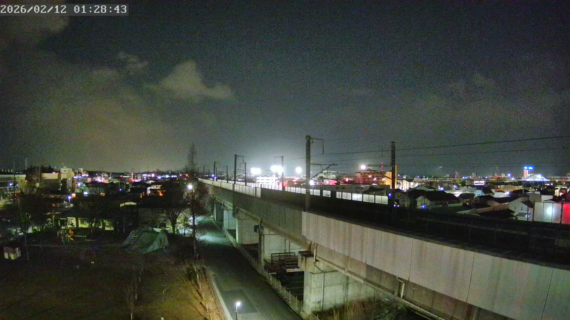 Koriyama City Skyline & Tonoku / Akita Shinkansen ( Bullet Train ) Viaduct ( 郡山市街のスカイラインと東濃・秋田新幹線高架橋 ) Live Cam - 2 Chome, Asakamachi Hidenoyama, Koriyama, Fukuşima, Tōhoku, Honshu, Japan