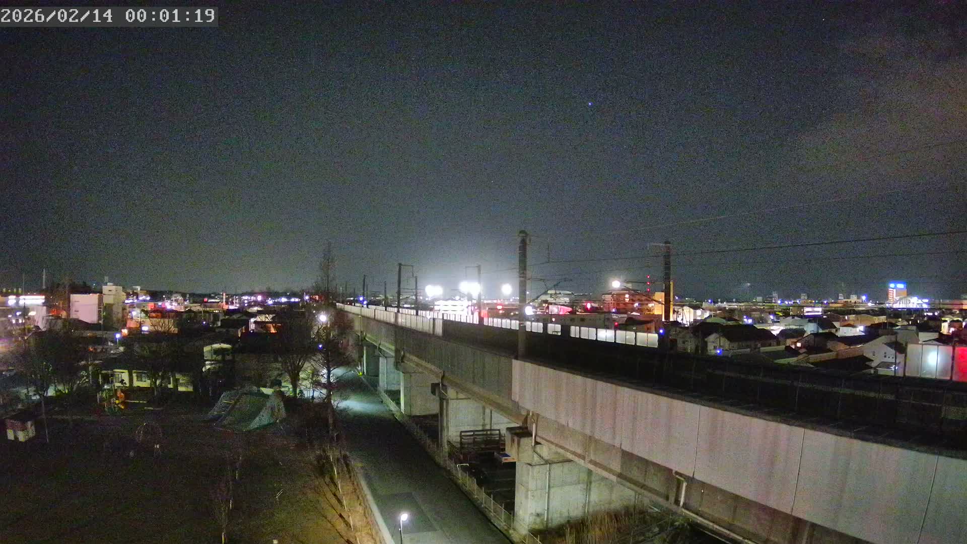 Koriyama City Skyline & Tonoku / Akita Shinkansen ( Bullet Train ) Viaduct ( 郡山市街のスカイラインと東濃・秋田新幹線高架橋 ) Live Cam - 2 Chome, Asakamachi Hidenoyama, Koriyama, Fukuşima, Tōhoku, Honshu, Japan