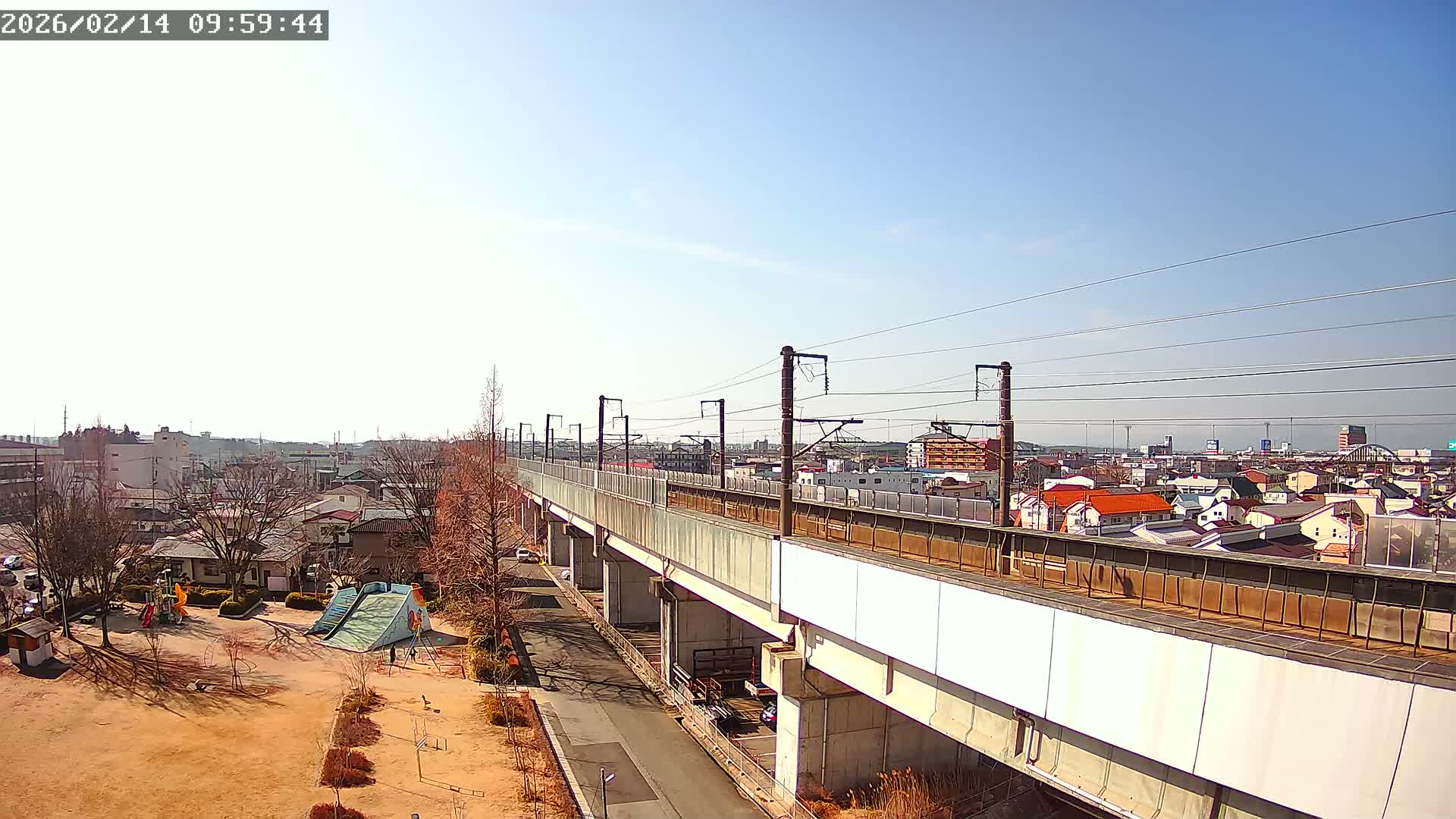 Koriyama City Skyline & Tonoku / Akita Shinkansen ( Bullet Train ) Viaduct ( 郡山市街のスカイラインと東濃・秋田新幹線高架橋 ) Live Cam - 2 Chome, Asakamachi Hidenoyama, Koriyama, Fukuşima, Tōhoku, Honshu, Japan