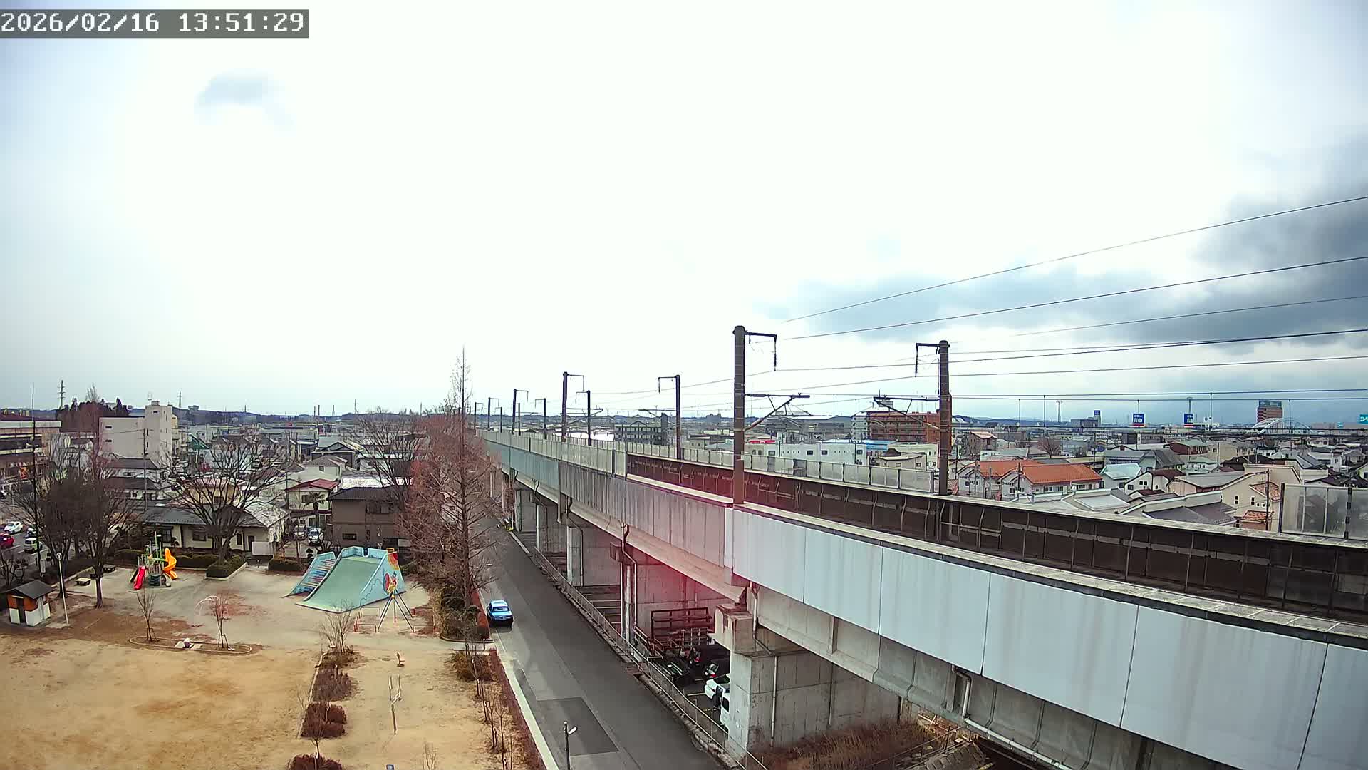 Koriyama City Skyline & Tonoku / Akita Shinkansen ( Bullet Train ) Viaduct ( 郡山市街のスカイラインと東濃・秋田新幹線高架橋 ) Live Cam - 2 Chome, Asakamachi Hidenoyama, Koriyama, Fukuşima, Tōhoku, Honshu, Japan