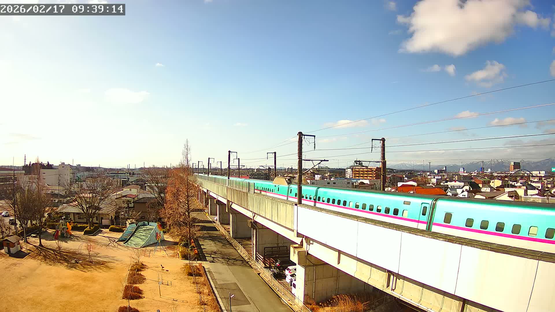Koriyama City Skyline & Tonoku / Akita Shinkansen ( Bullet Train ) Viaduct ( 郡山市街のスカイラインと東濃・秋田新幹線高架橋 ) Live Cam - 2 Chome, Asakamachi Hidenoyama, Koriyama, Fukuşima, Tōhoku, Honshu, Japan
