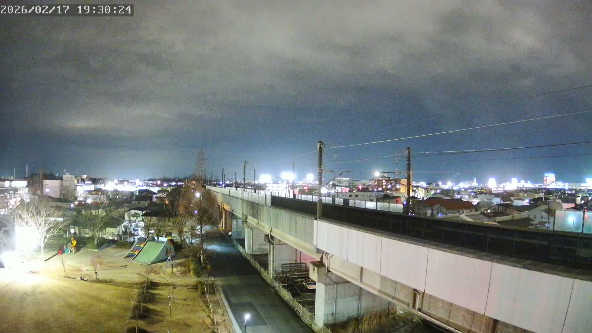 Koriyama City Skyline & Tonoku / Akita Shinkansen ( Bullet Train ) Viaduct ( 郡山市街のスカイラインと東濃・秋田新幹線高架橋 ) Live Cam - 2 Chome, Asakamachi Hidenoyama, Koriyama, Fukuşima, Tōhoku, Honshu, Japan