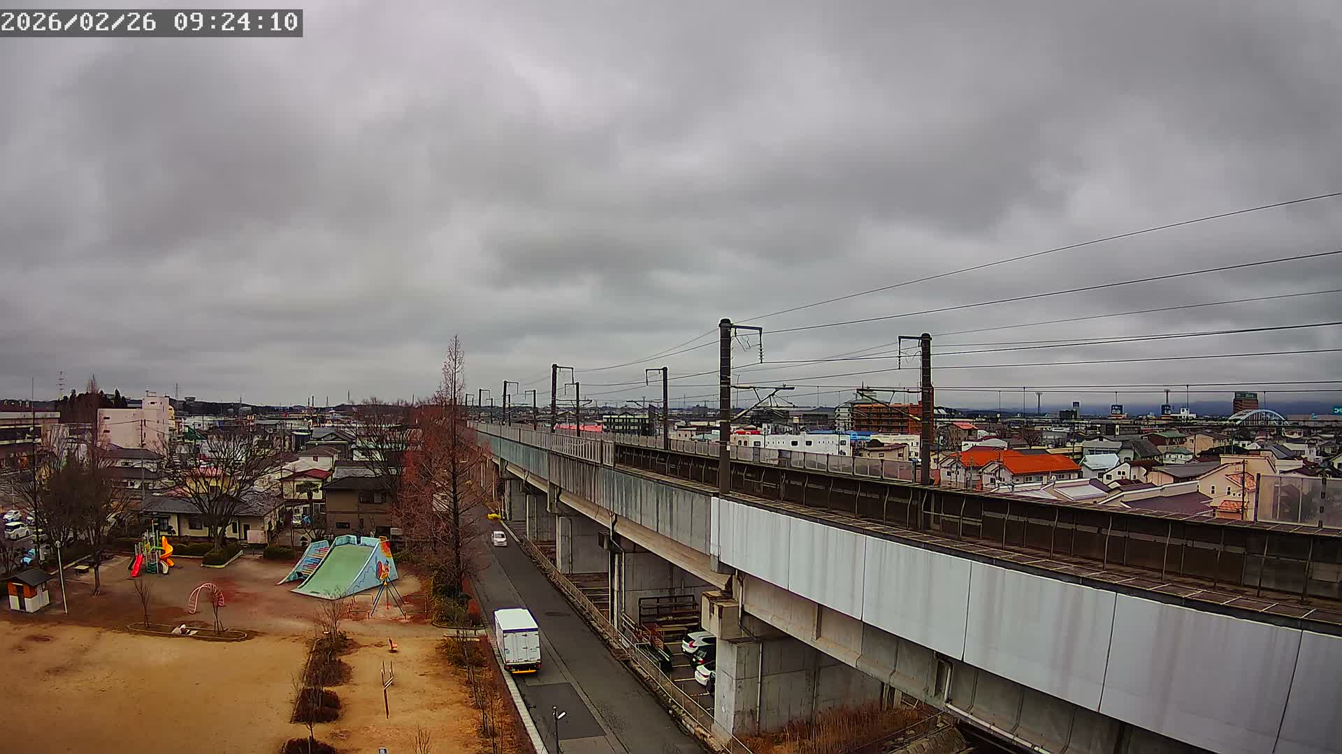 Koriyama City Skyline & Tonoku / Akita Shinkansen ( Bullet Train ) Viaduct ( 郡山市街のスカイラインと東濃・秋田新幹線高架橋 ) Live Cam - 2 Chome, Asakamachi Hidenoyama, Koriyama, Fukuşima, Tōhoku, Honshu, Japan