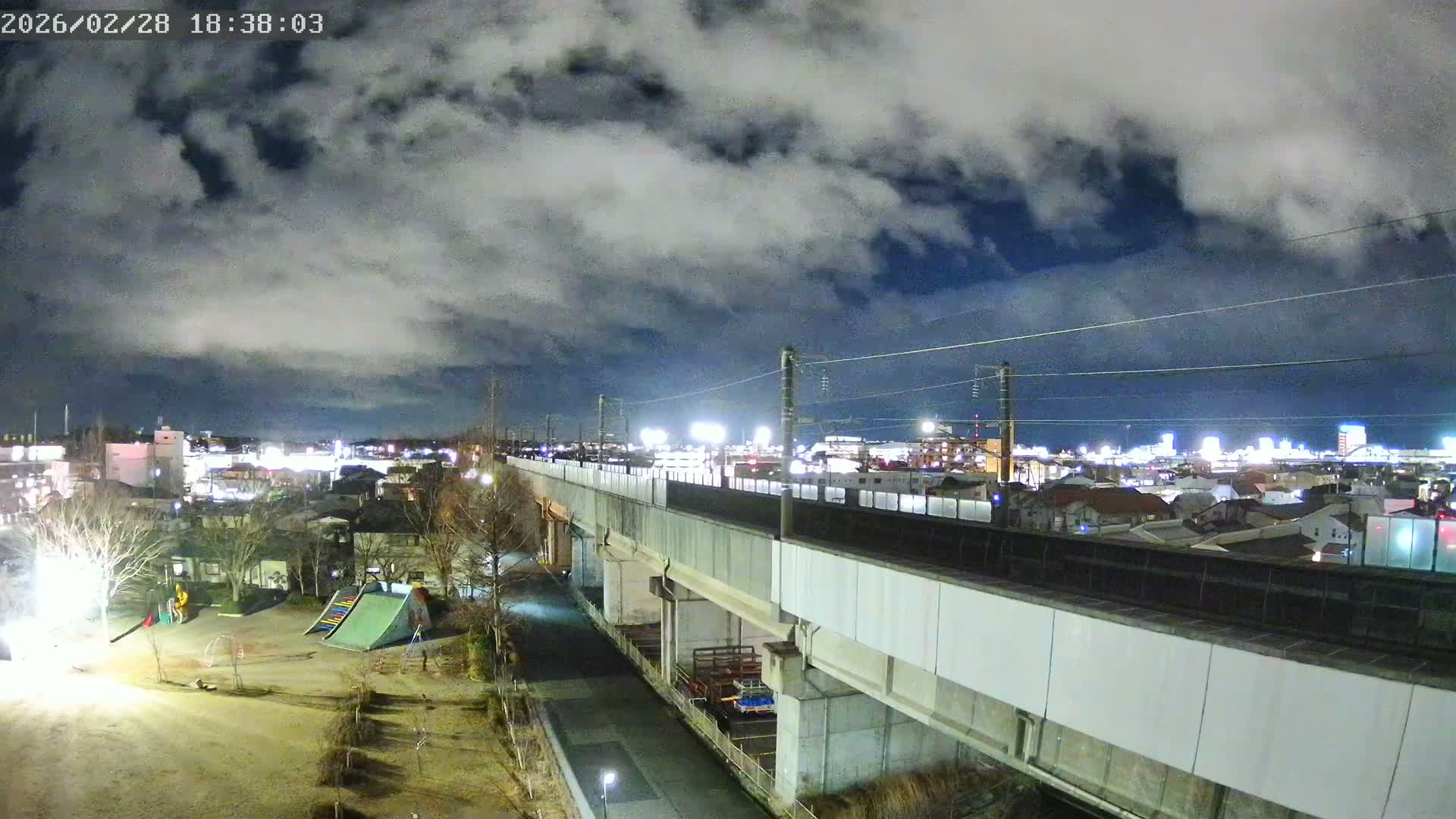 Koriyama City Skyline & Tonoku / Akita Shinkansen ( Bullet Train ) Viaduct ( 郡山市街のスカイラインと東濃・秋田新幹線高架橋 ) Live Cam - 2 Chome, Asakamachi Hidenoyama, Koriyama, Fukuşima, Tōhoku, Honshu, Japan