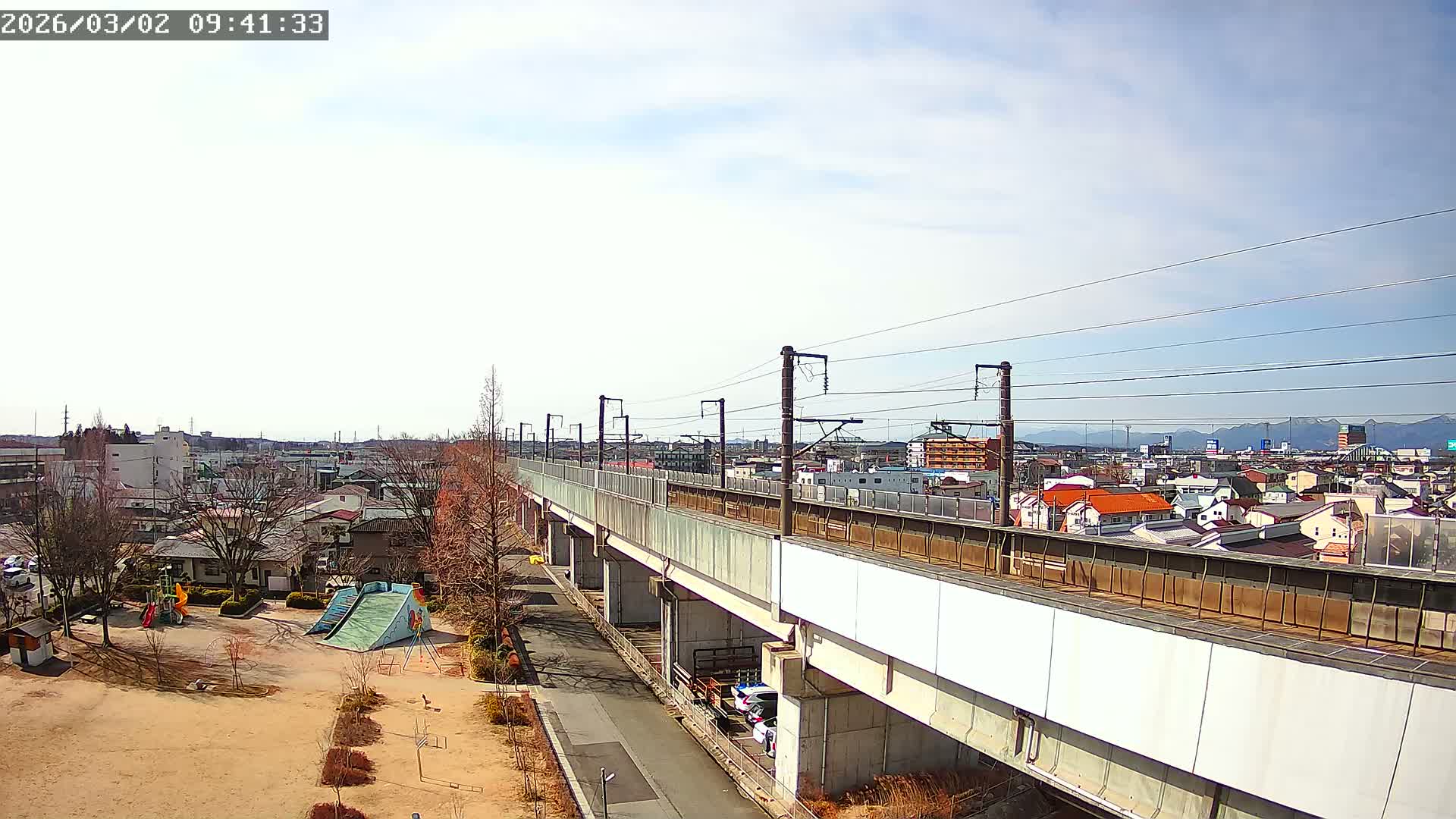 Koriyama City Skyline & Tonoku / Akita Shinkansen ( Bullet Train ) Viaduct ( 郡山市街のスカイラインと東濃・秋田新幹線高架橋 ) Live Cam - 2 Chome, Asakamachi Hidenoyama, Koriyama, Fukuşima, Tōhoku, Honshu, Japan