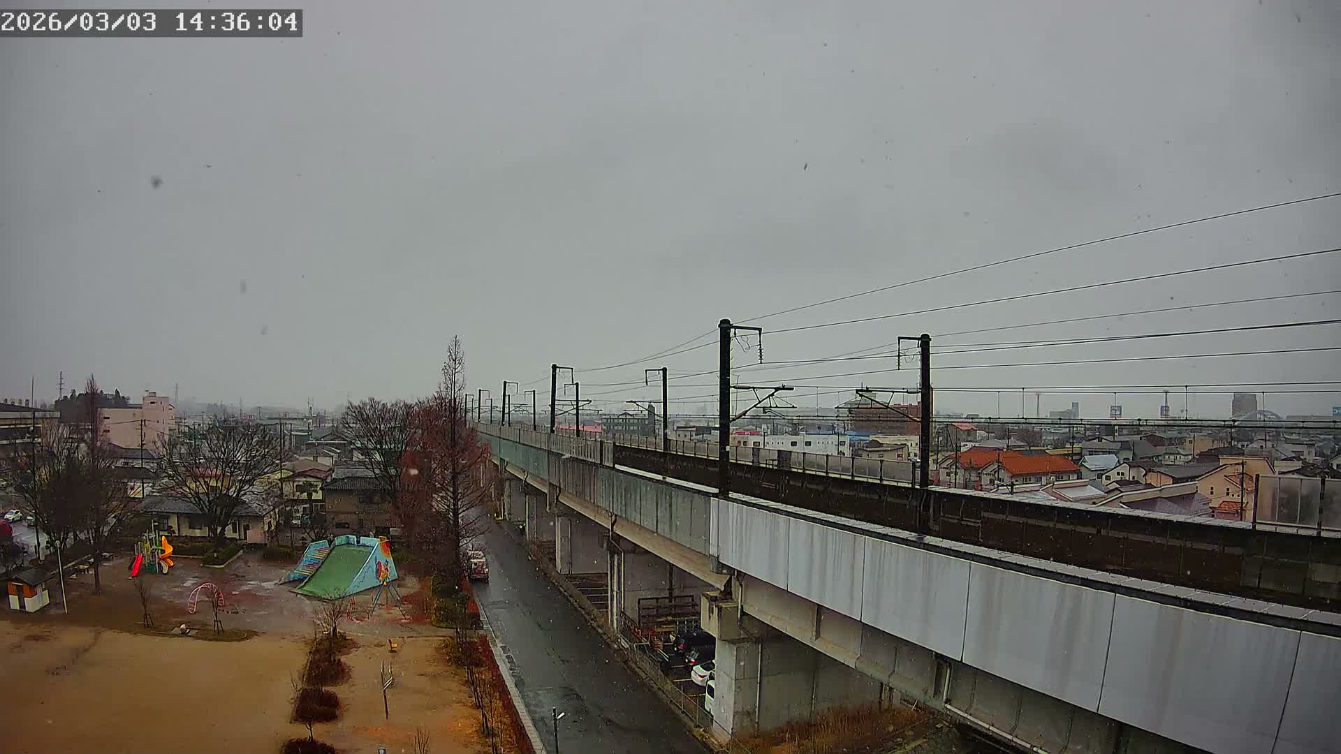 Koriyama City Skyline & Tonoku / Akita Shinkansen ( Bullet Train ) Viaduct ( 郡山市街のスカイラインと東濃・秋田新幹線高架橋 ) Live Cam - 2 Chome, Asakamachi Hidenoyama, Koriyama, Fukuşima, Tōhoku, Honshu, Japan