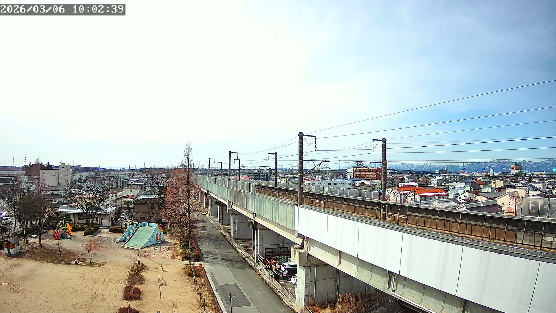 Koriyama City Skyline & Tonoku / Akita Shinkansen ( Bullet Train ) Viaduct ( 郡山市街のスカイラインと東濃・秋田新幹線高架橋 ) Live Cam - 2 Chome, Asakamachi Hidenoyama, Koriyama, Fukuşima, Tōhoku, Honshu, Japan