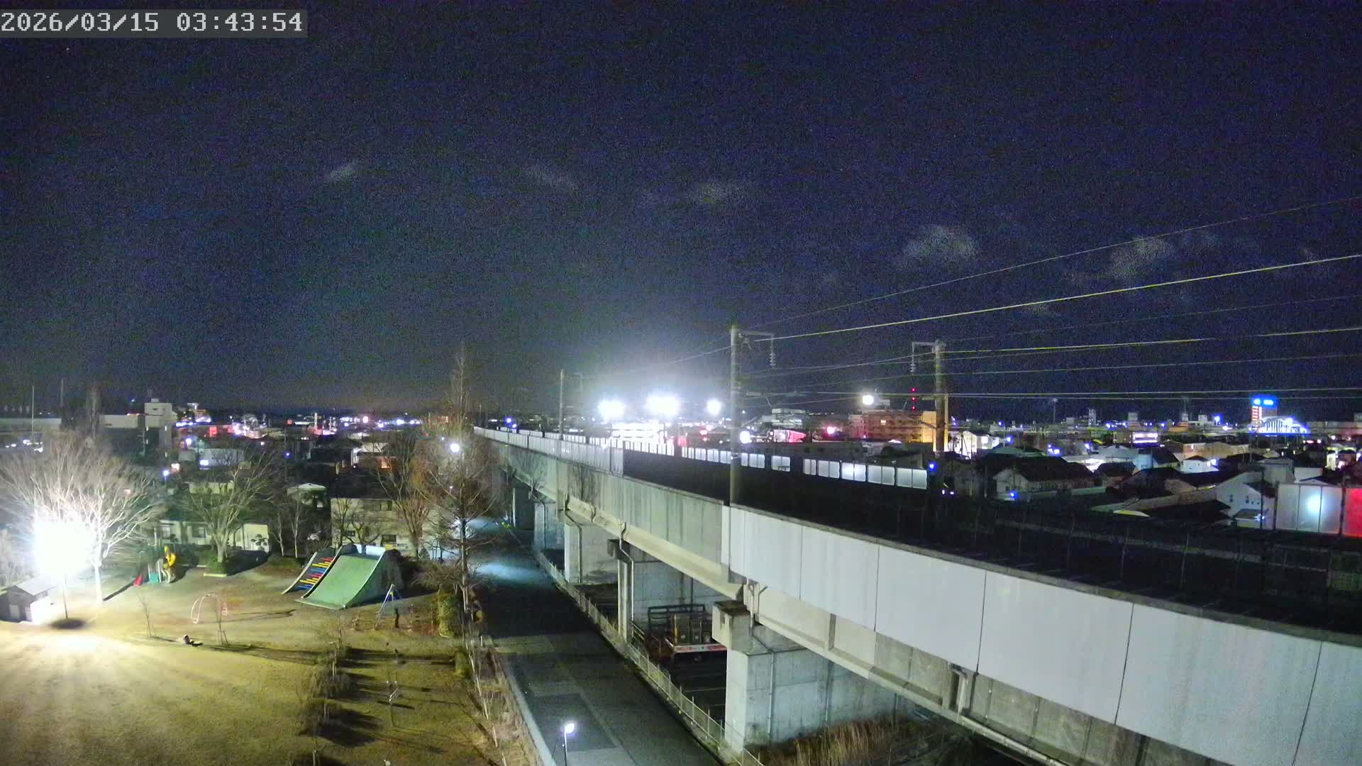 Koriyama City Skyline & Tonoku / Akita Shinkansen ( Bullet Train ) Viaduct ( 郡山市街のスカイラインと東濃・秋田新幹線高架橋 ) Live Cam - 2 Chome, Asakamachi Hidenoyama, Koriyama, Fukuşima, Tōhoku, Honshu, Japan