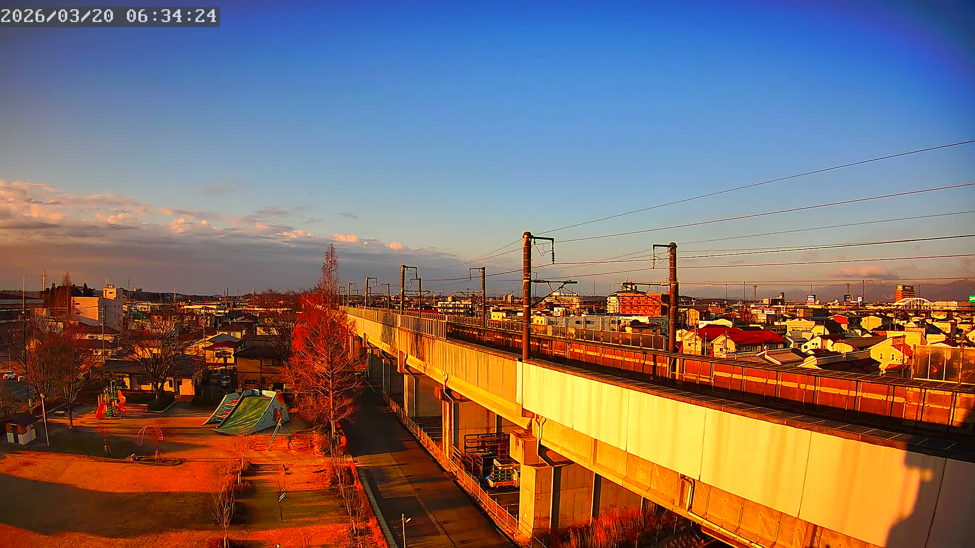 Koriyama City Skyline & Tonoku / Akita Shinkansen ( Bullet Train ) Viaduct ( 郡山市街のスカイラインと東濃・秋田新幹線高架橋 ) Live Cam - 2 Chome, Asakamachi Hidenoyama, Koriyama, Fukuşima, Tōhoku, Honshu, Japan