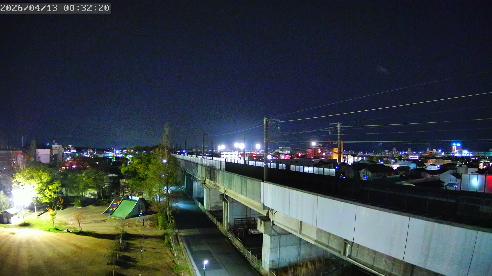 Koriyama City Skyline & Tonoku / Akita Shinkansen ( Bullet Train ) Viaduct ( 郡山市街のスカイラインと東濃・秋田新幹線高架橋 ) Live Cam - 2 Chome, Asakamachi Hidenoyama, Koriyama, Fukuşima, Tōhoku, Honshu, Japan