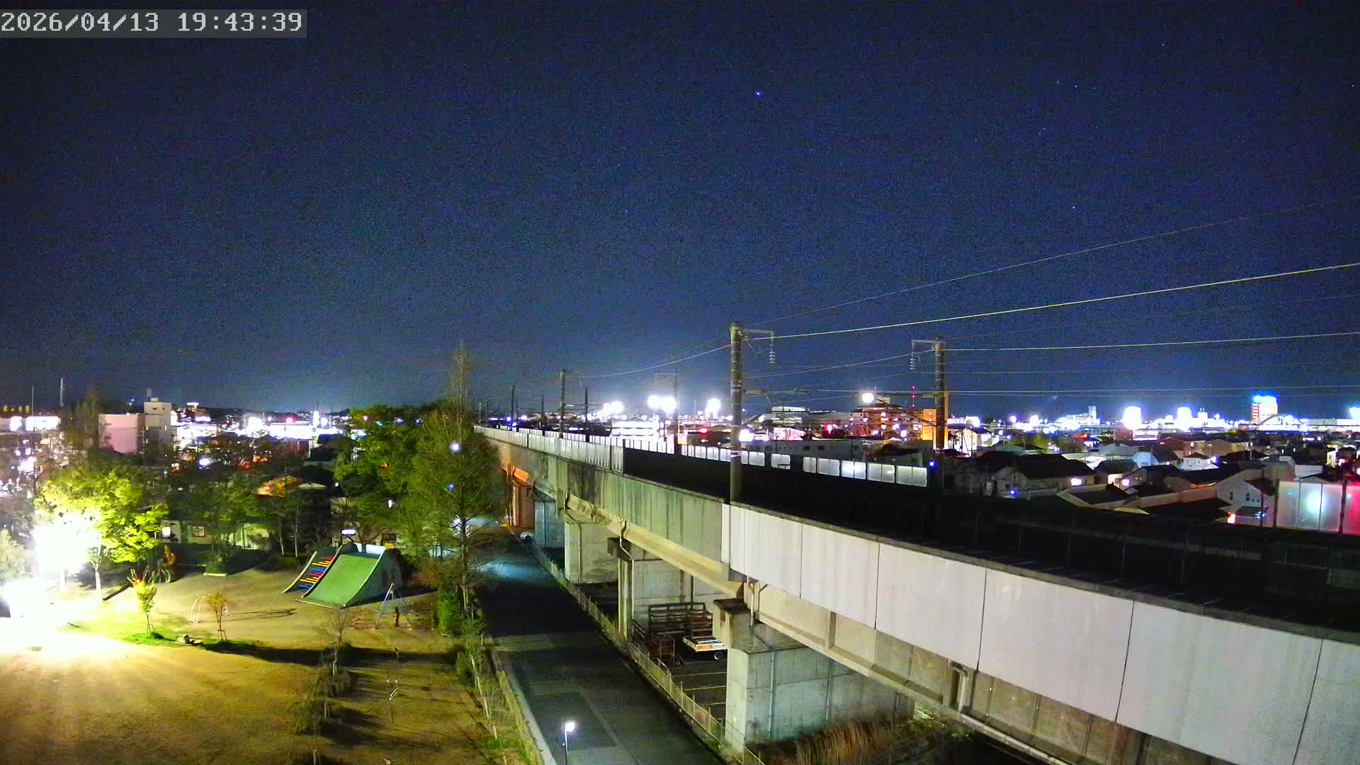 Koriyama City Skyline & Tonoku / Akita Shinkansen ( Bullet Train ) Viaduct ( 郡山市街のスカイラインと東濃・秋田新幹線高架橋 ) Live Cam - 2 Chome, Asakamachi Hidenoyama, Koriyama, Fukuşima, Tōhoku, Honshu, Japan