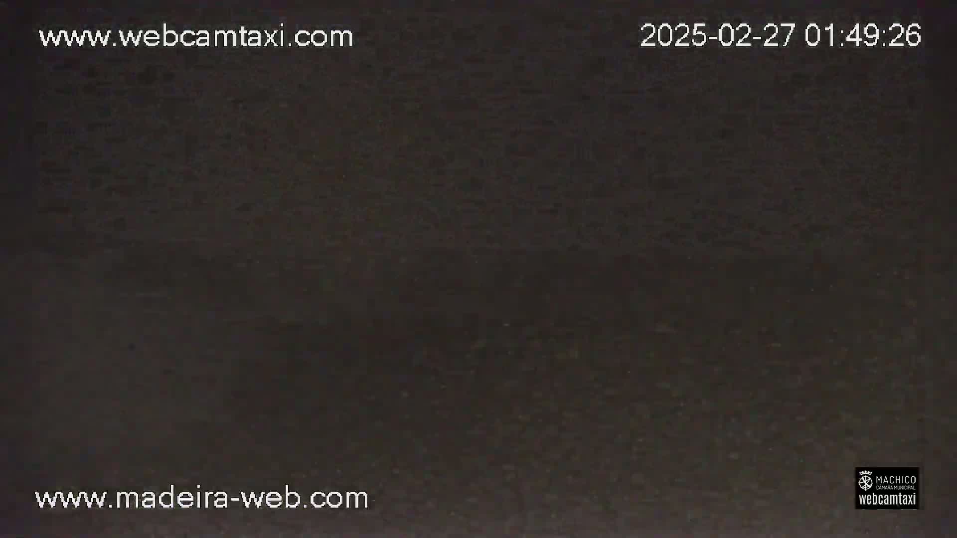 A dark, uniformly colored image shows a solid black surface.