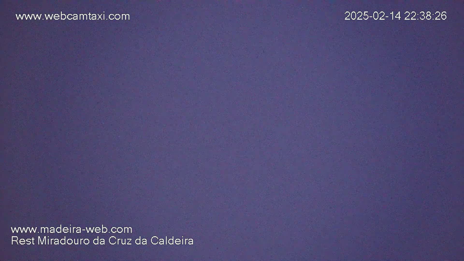 A solid, dark purple screen is shown.