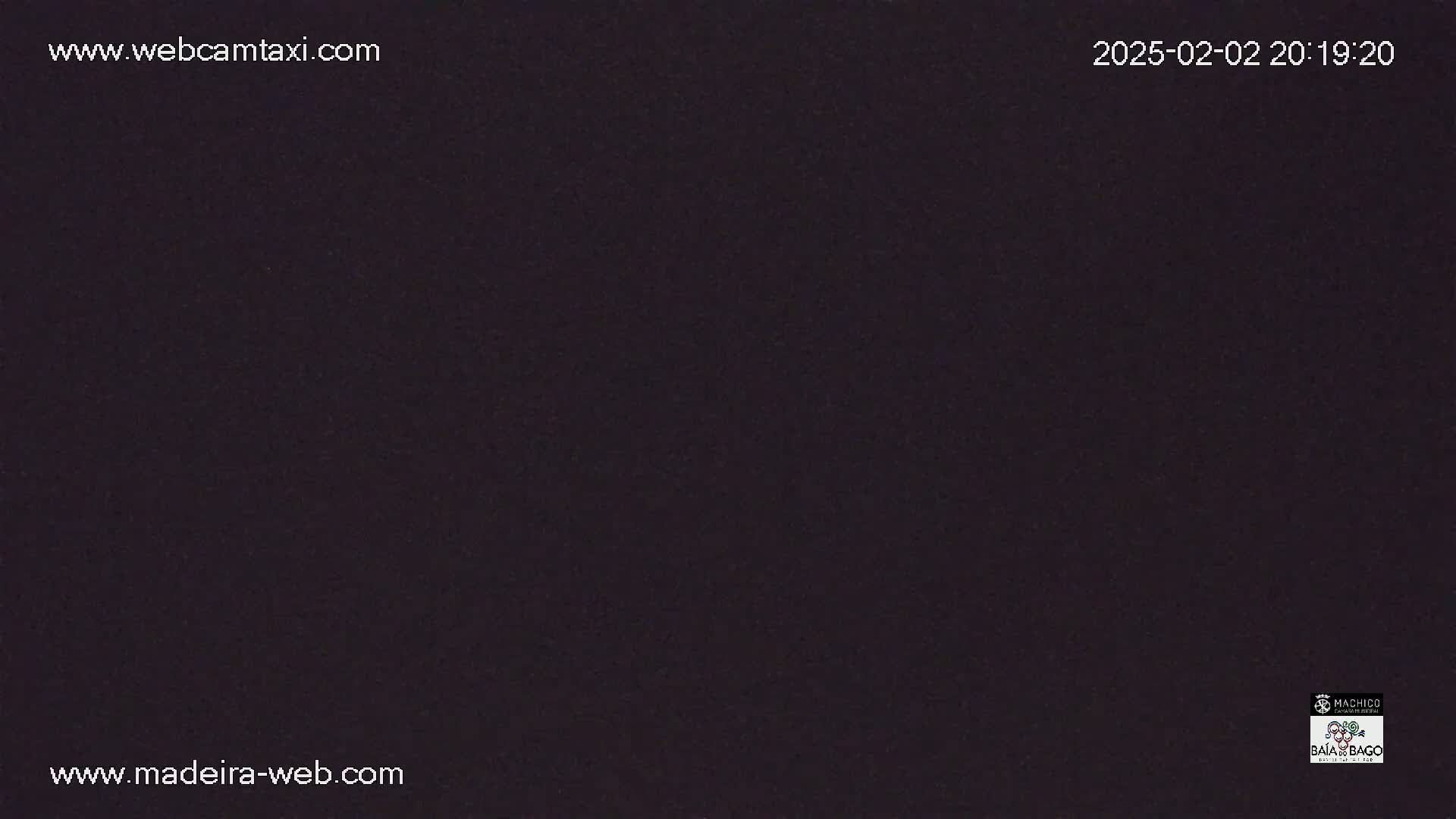 The image shows a solid dark-colored screen.