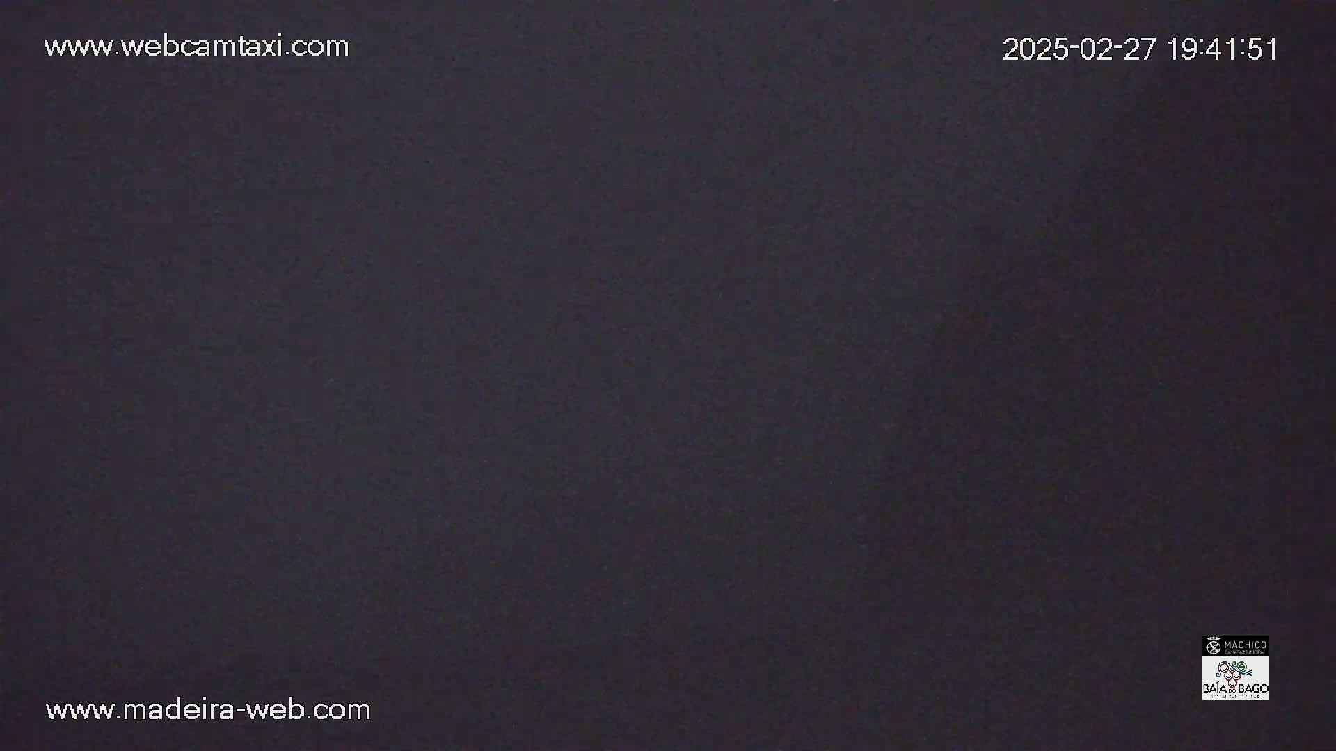 A dark, solid-colored image fills the frame.