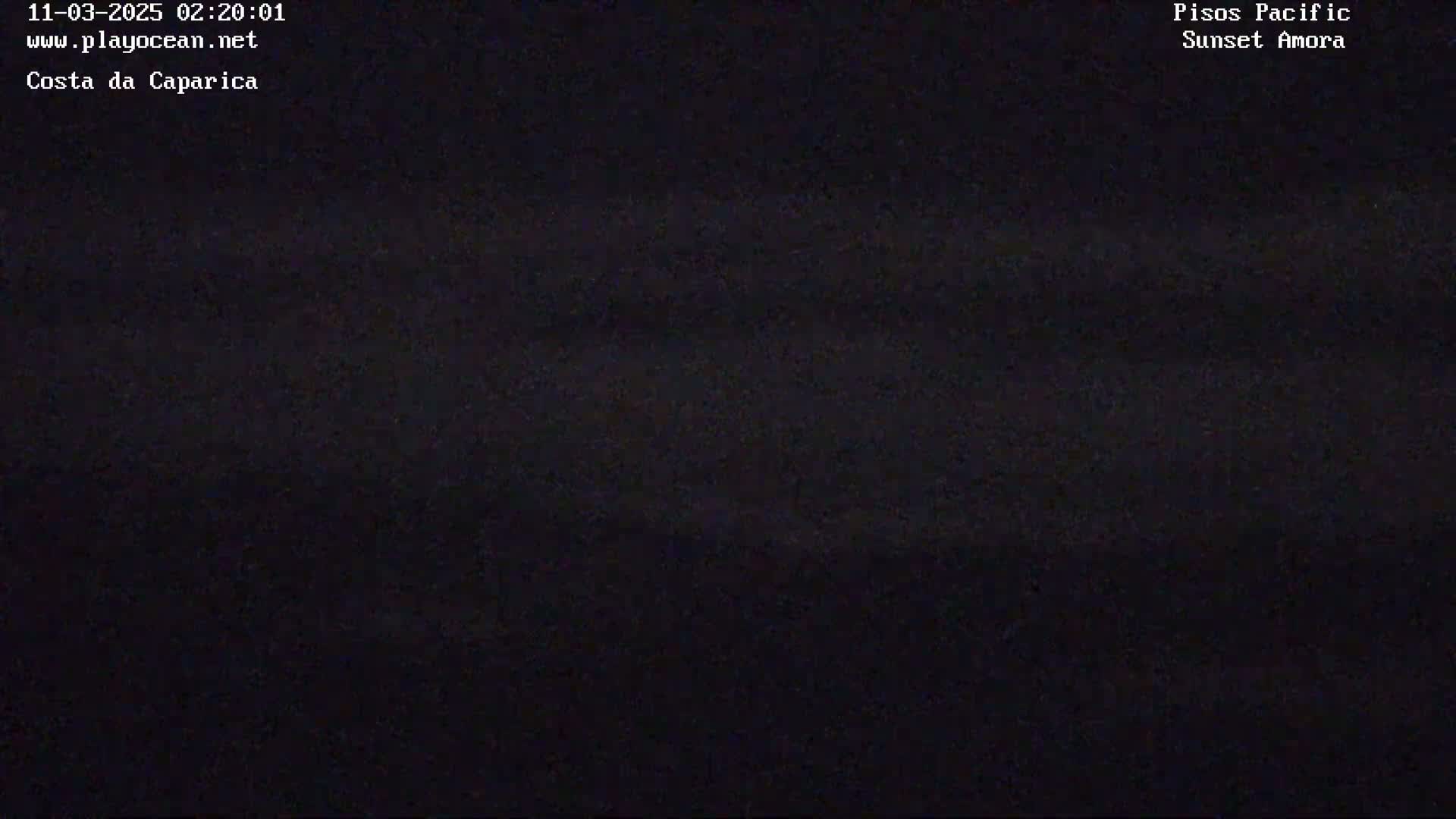 The image shows a dark, nighttime scene with little to no visible details.