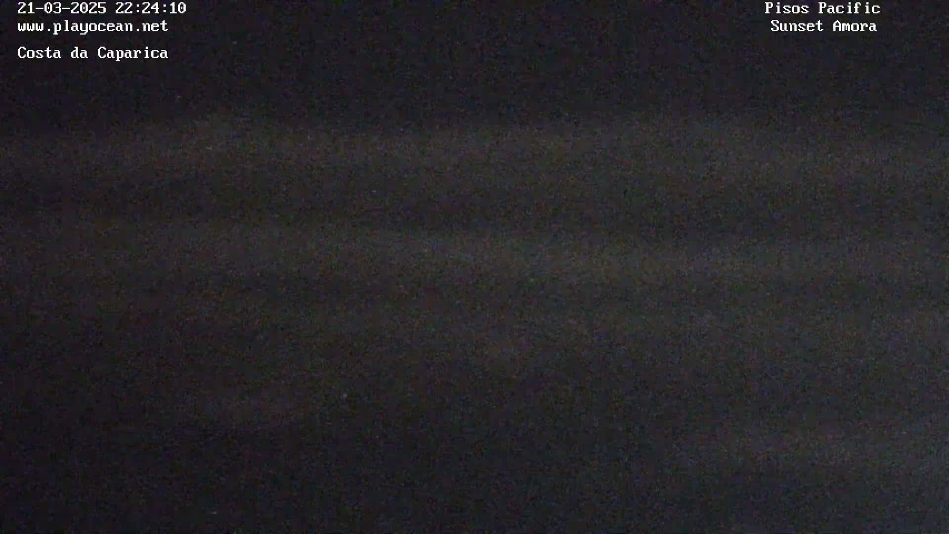A dark, nighttime image shows a mostly black sky with subtle variations in shading.