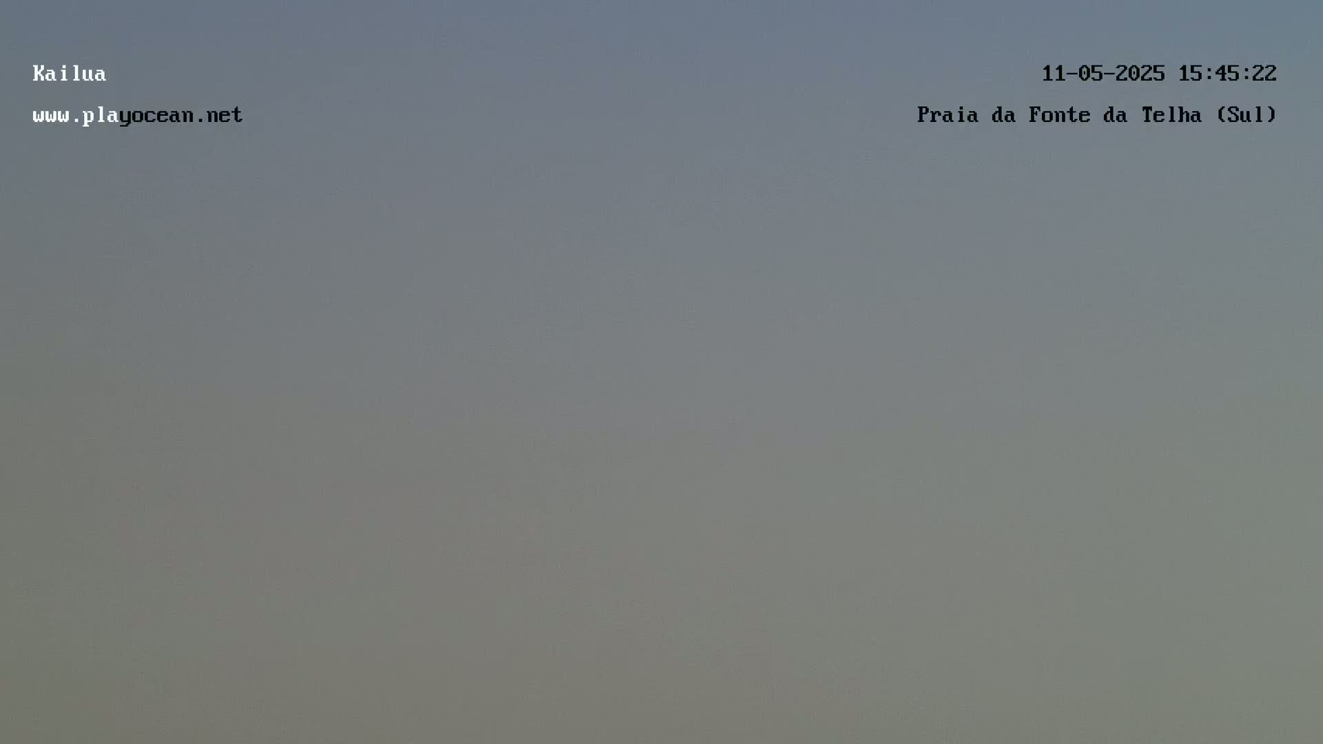 The image shows a hazy, overcast sky.
