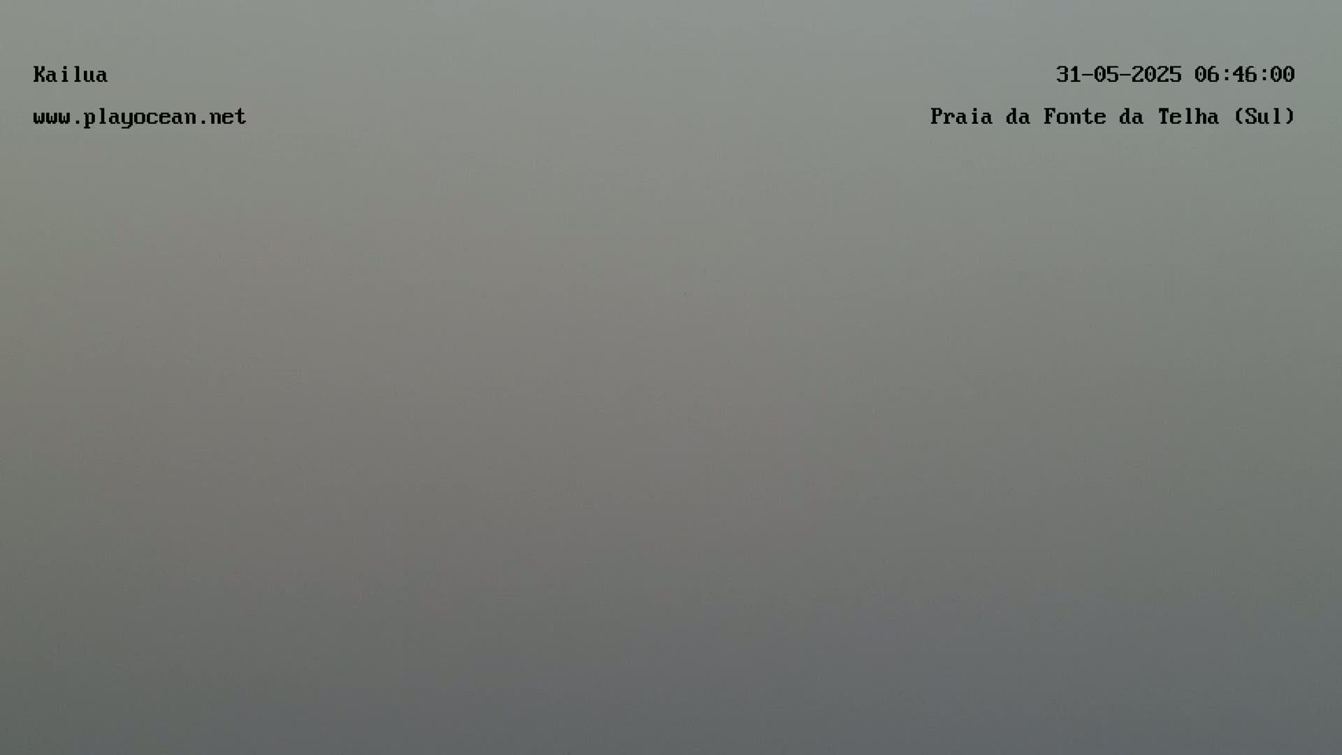 A uniformly gray, hazy image shows a very overcast sky.