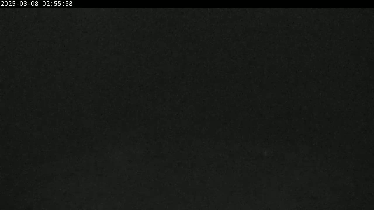 The image shows a completely dark, uniformly textured surface.