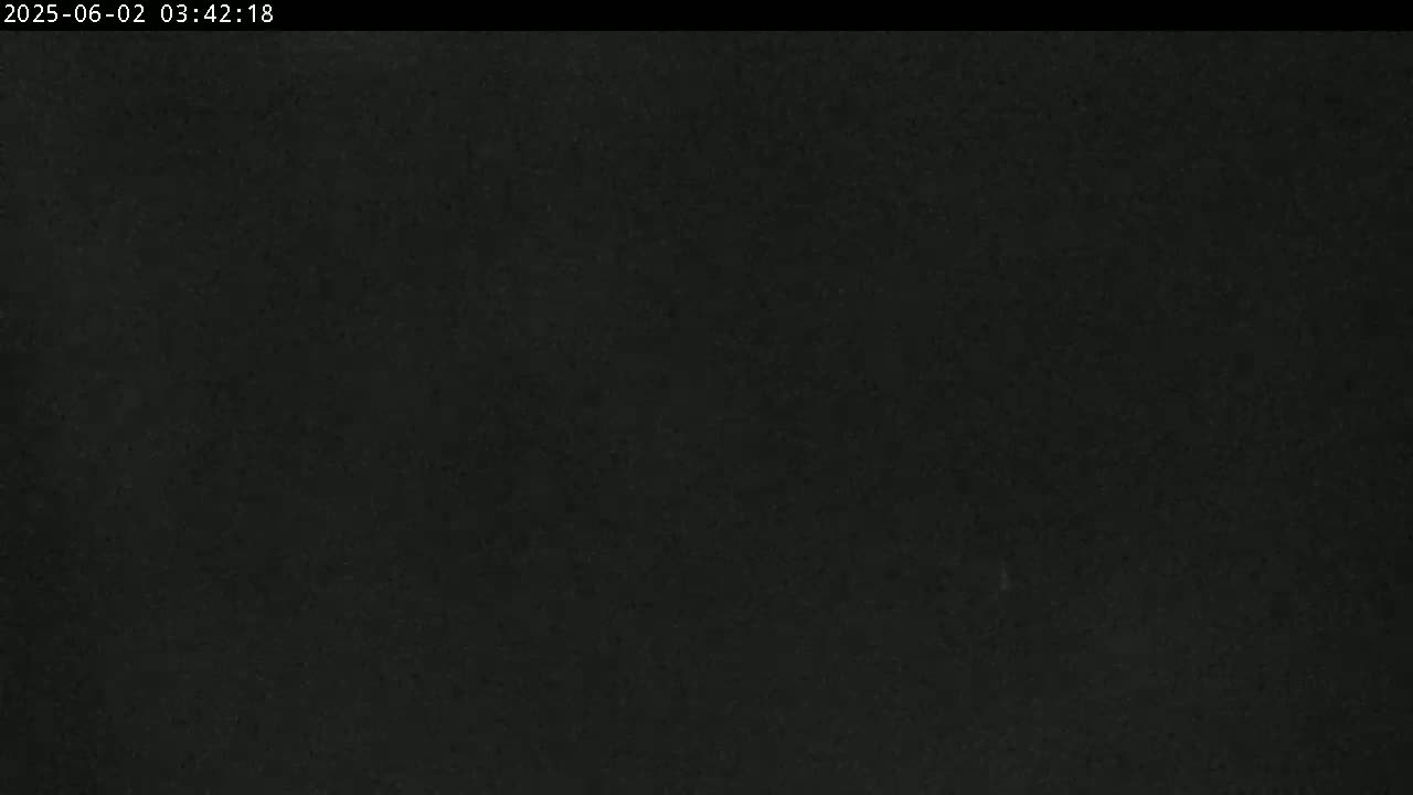 The image shows a completely dark, uniformly textured surface.