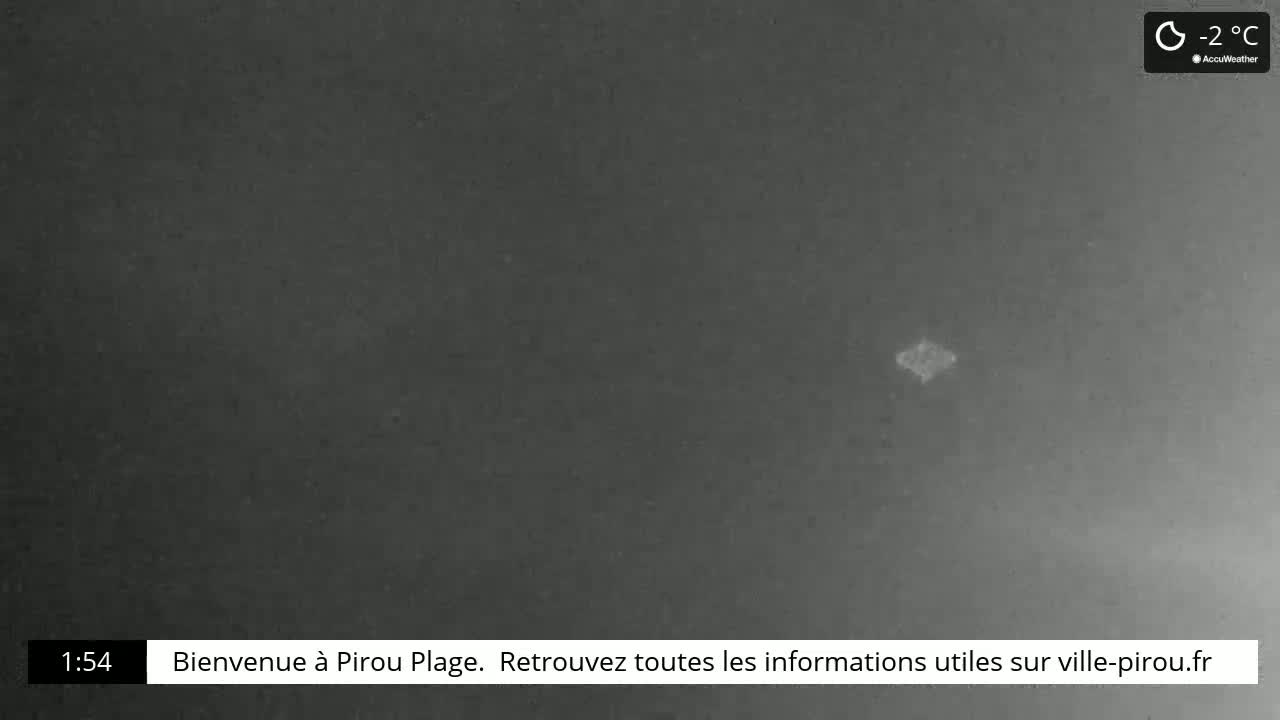A dark, nighttime scene shows a small, bright object in the sky at -2°C.