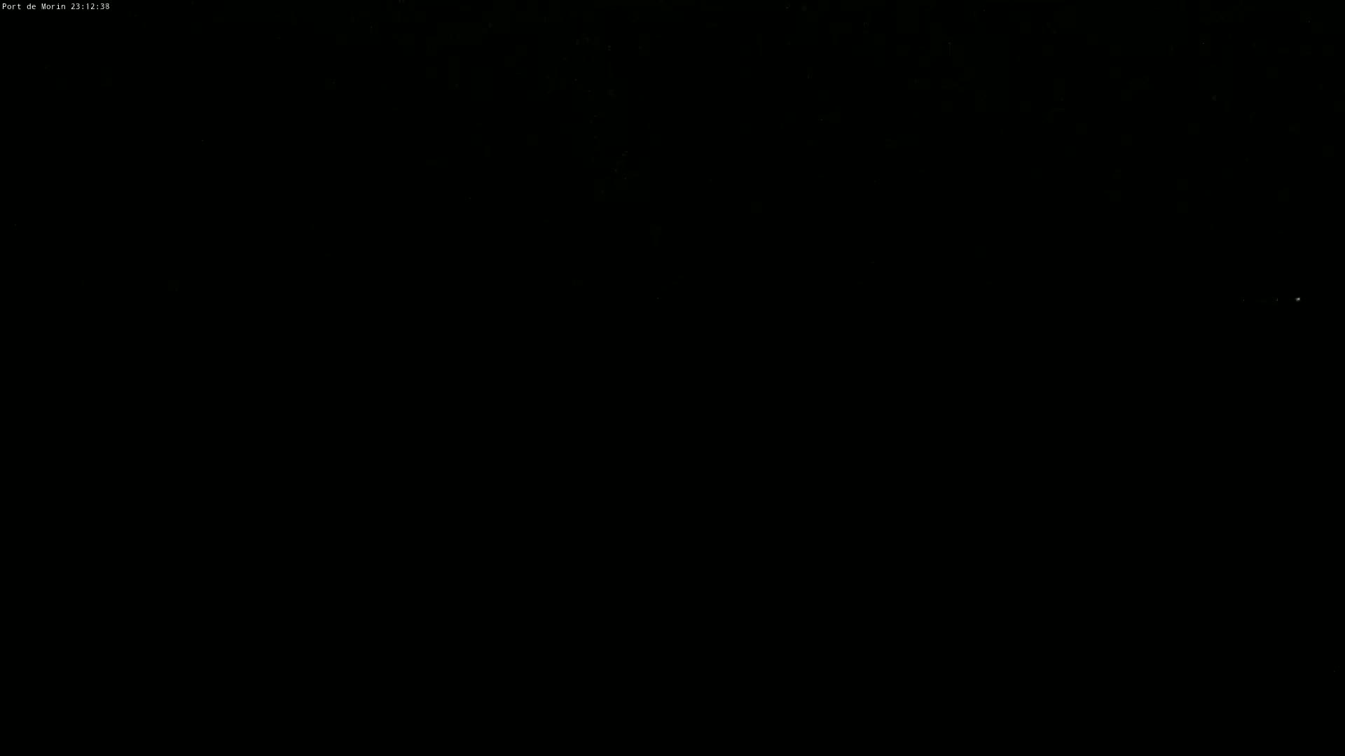 The image shows a completely dark scene at night.