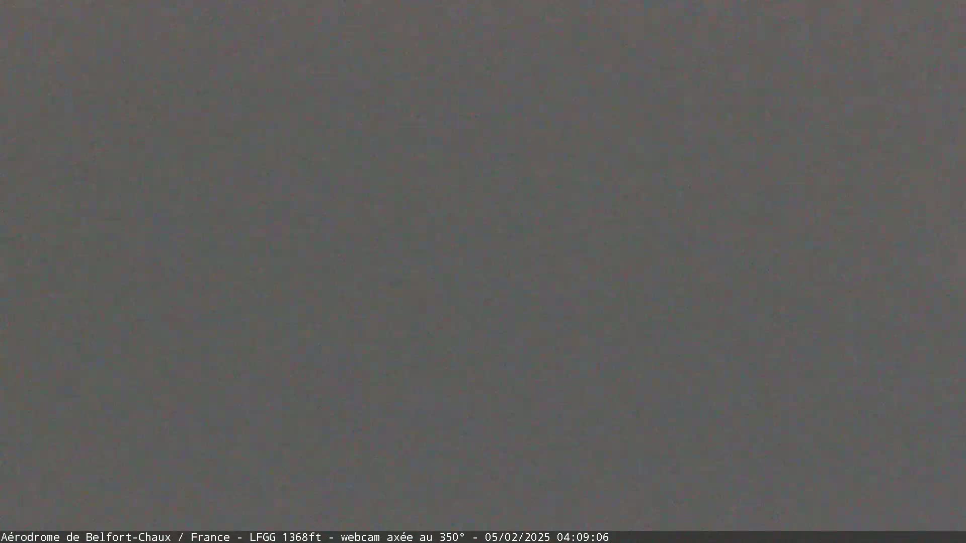 A uniformly dark gray image shows a solid, featureless expanse.