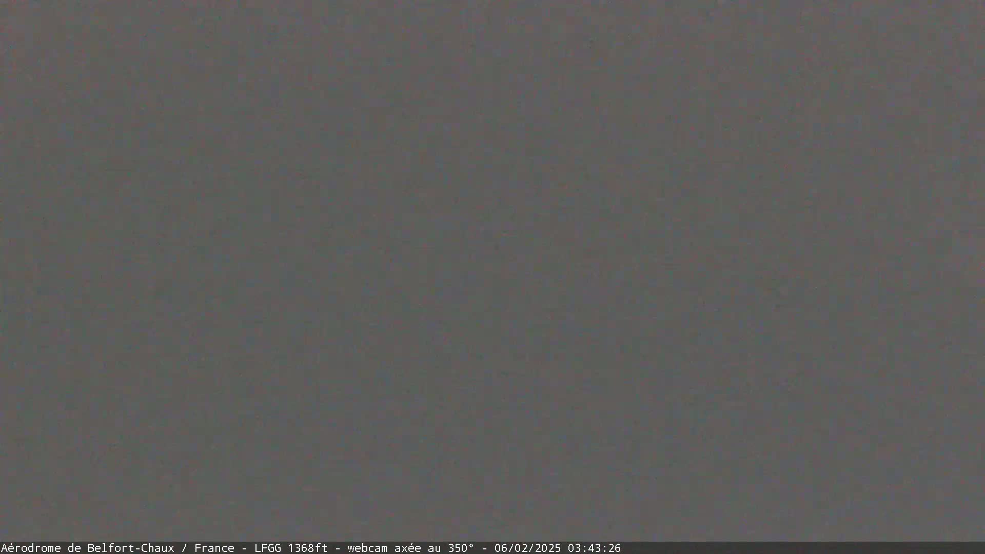 A uniformly gray image shows a solid, featureless expanse.
