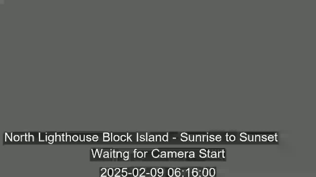 A solid dark gray screen displays a message indicating that a camera is waiting to start recording a sunrise-to-sunset view.