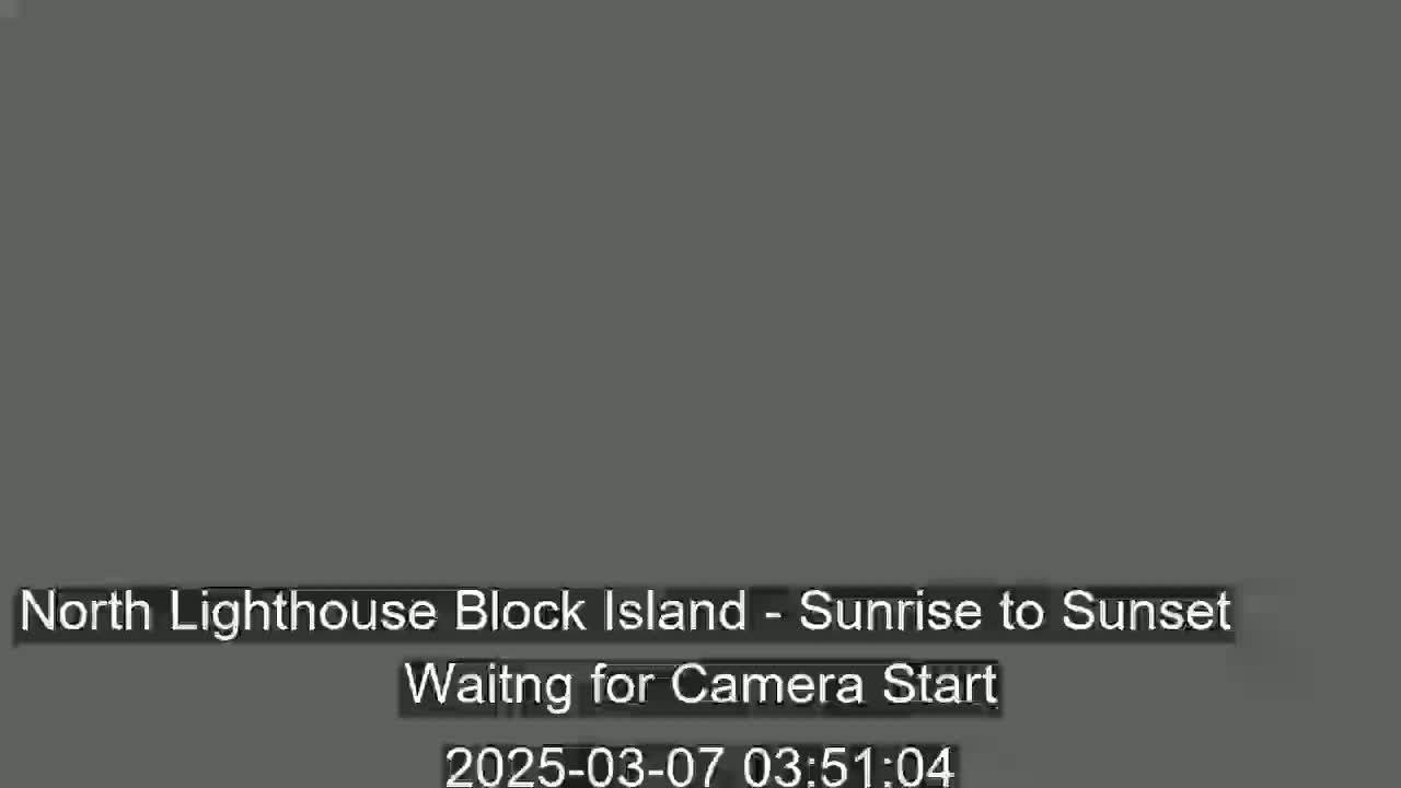 A dark gray screen displays a message indicating that a camera is waiting to start recording a sunrise-to-sunset view.