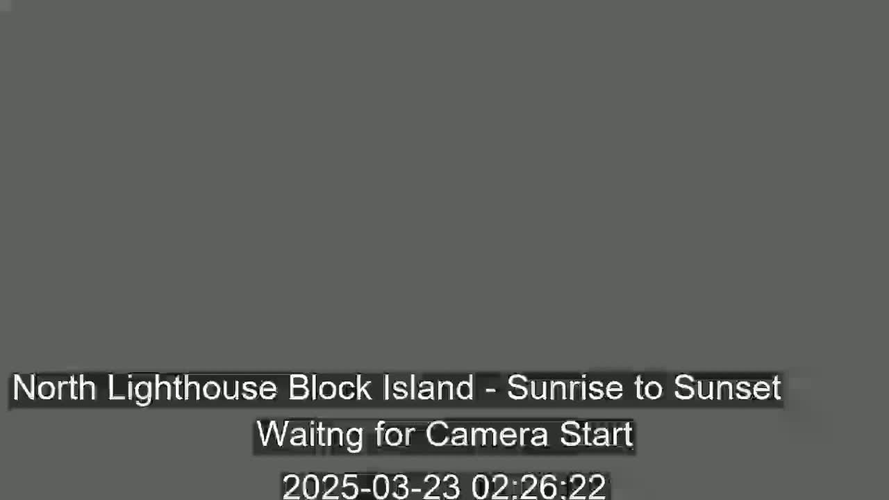 A solid dark gray screen displays a message indicating that a camera is waiting to start recording a sunrise-to-sunset timelapse.