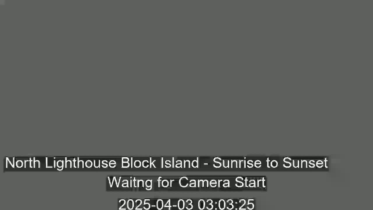A solid, dark gray screen displays a message indicating a camera is waiting to start recording a sunrise to sunset timelapse.