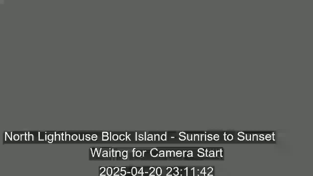 A solid, dark gray screen displays a message indicating that a camera is waiting to start recording a sunrise-to-sunset timelapse.