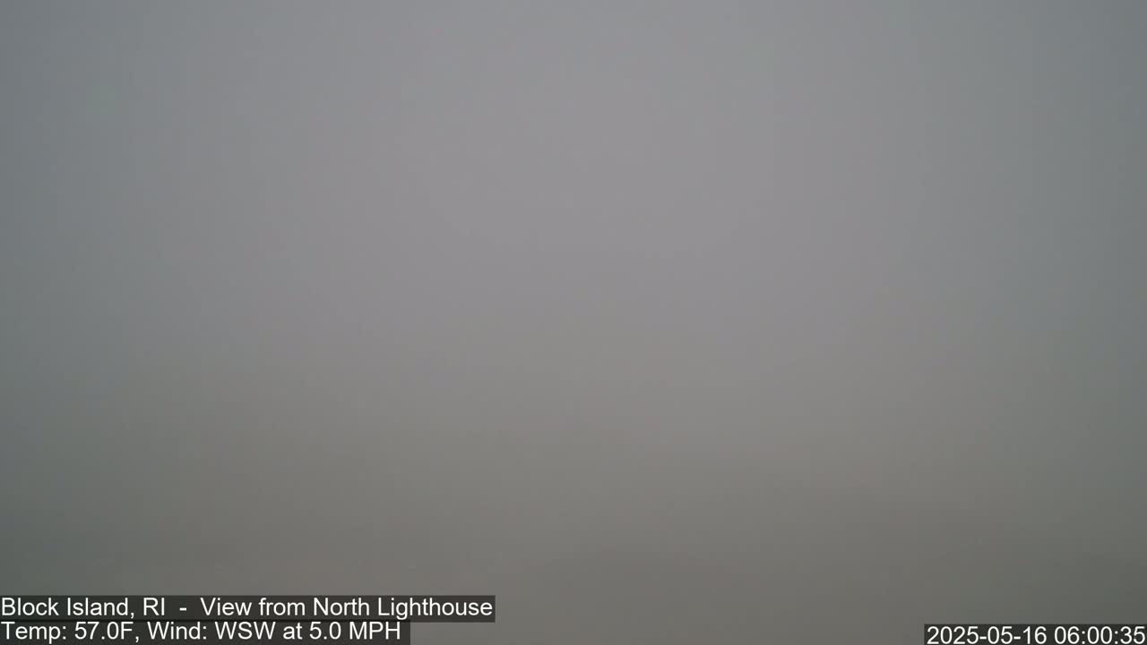 A foggy, gray scene is visible with a 57°F temperature and a 5 mph wind from the west-southwest.