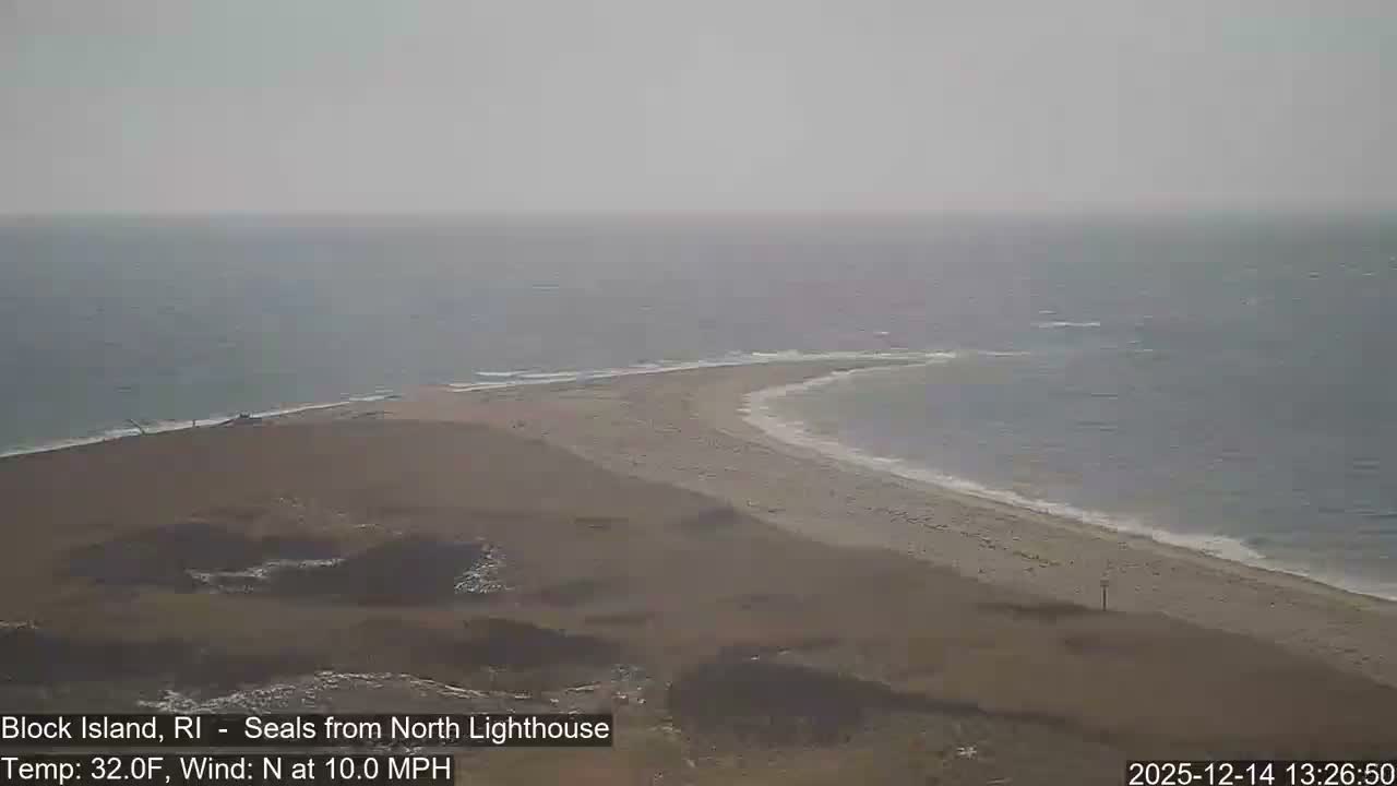 The image displays a solid dark grey screen, indicating nighttime conditions before sunrise.