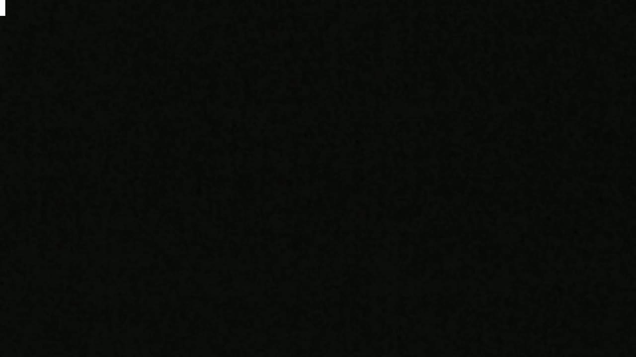 The image is a completely black, uniformly textured background.