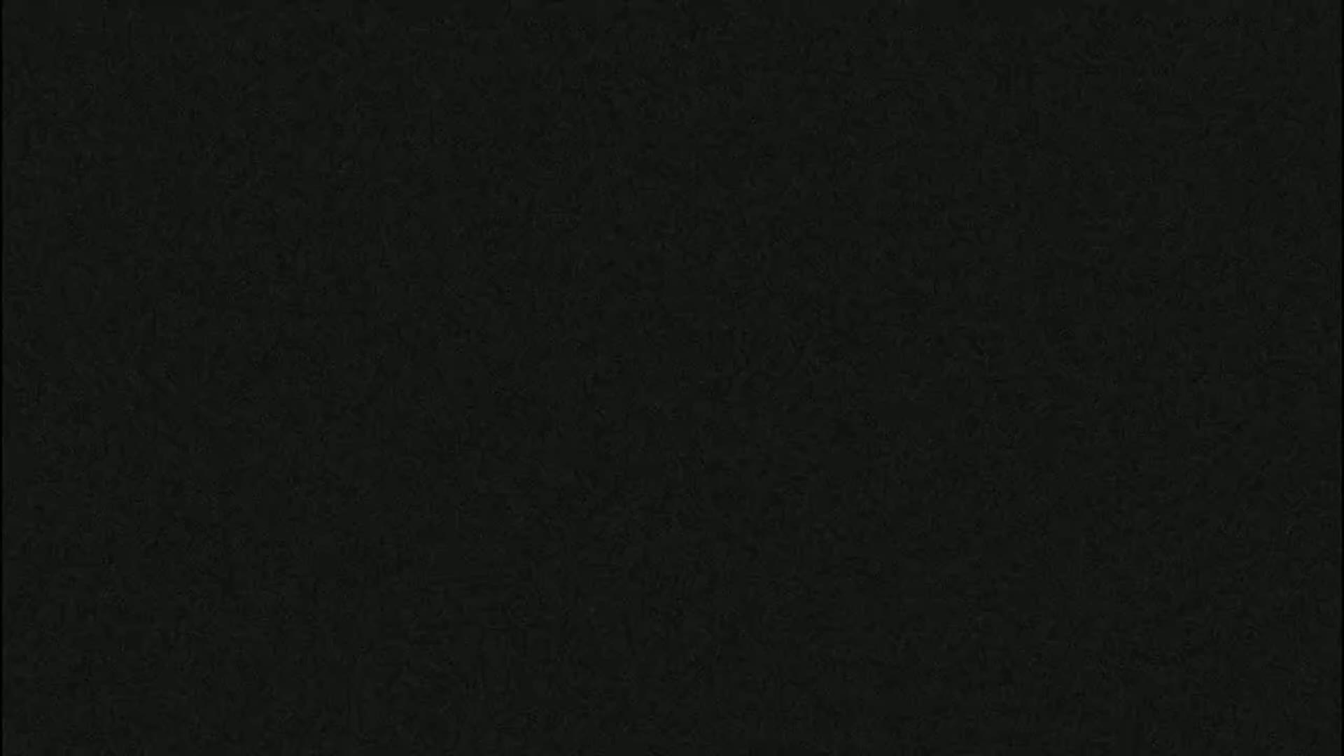 The image is a solid dark-grey/black texture.