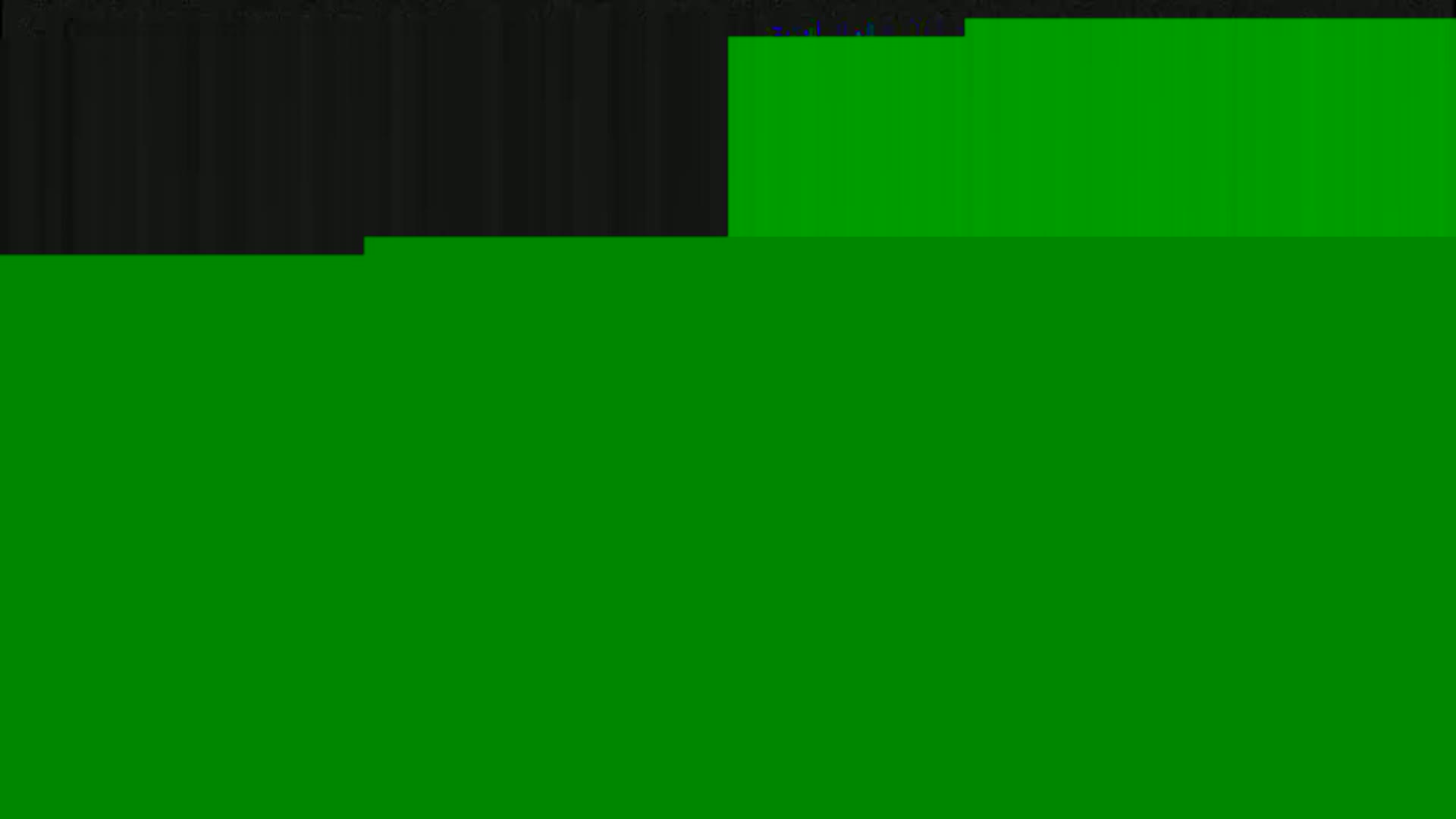 The image shows a mostly green surface with a smaller dark area at the top.