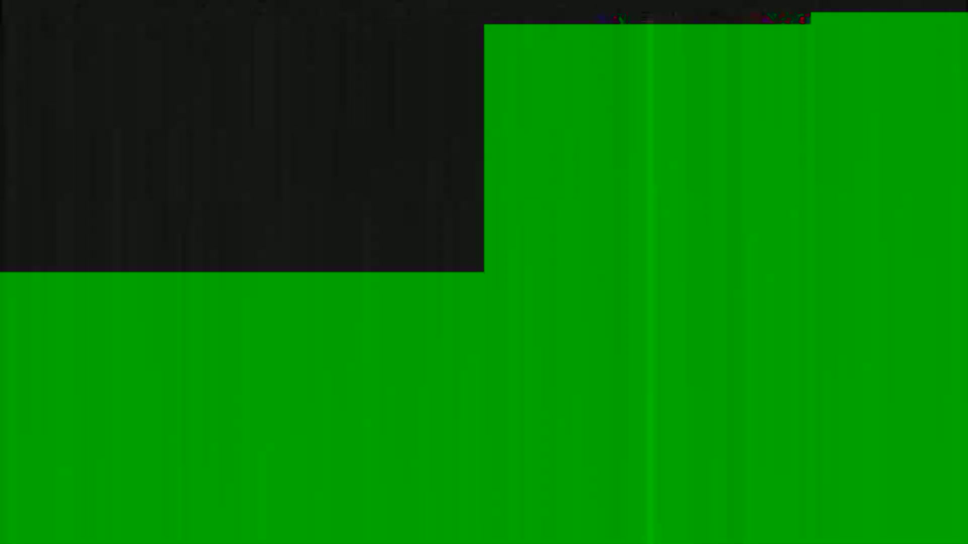 The image shows a mostly green screen with a smaller black area in the upper left corner.