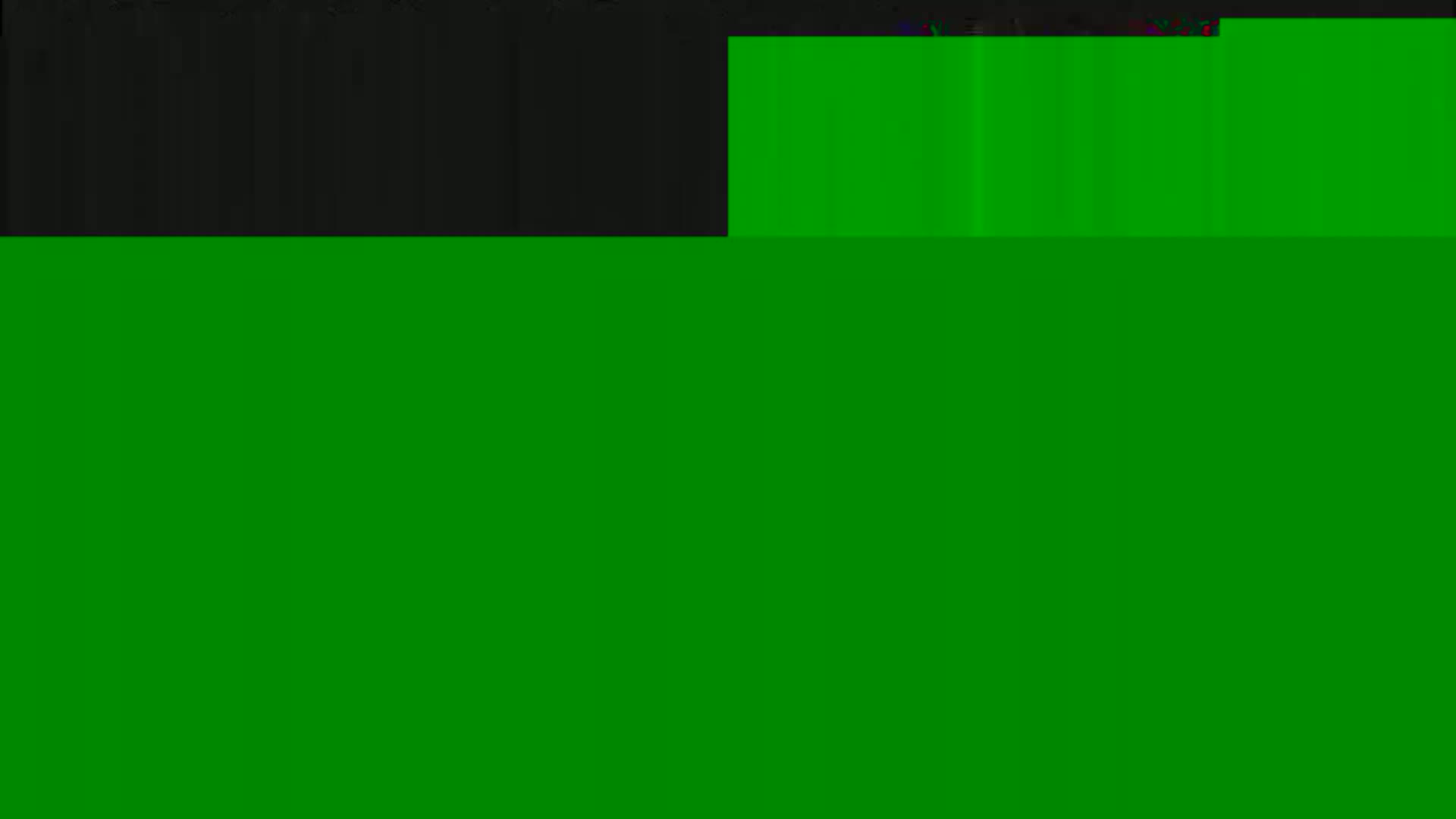 The image shows a mostly green screen with a smaller black area at the top.