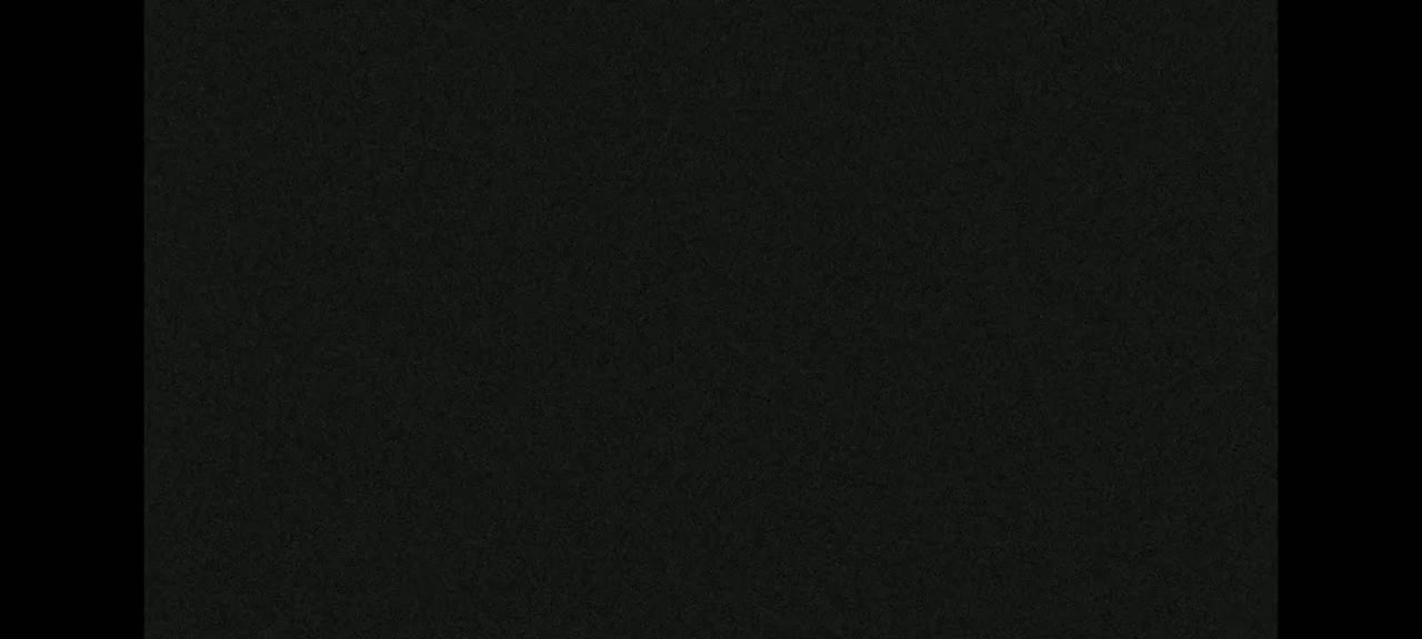 The image shows a dark-green textured surface.