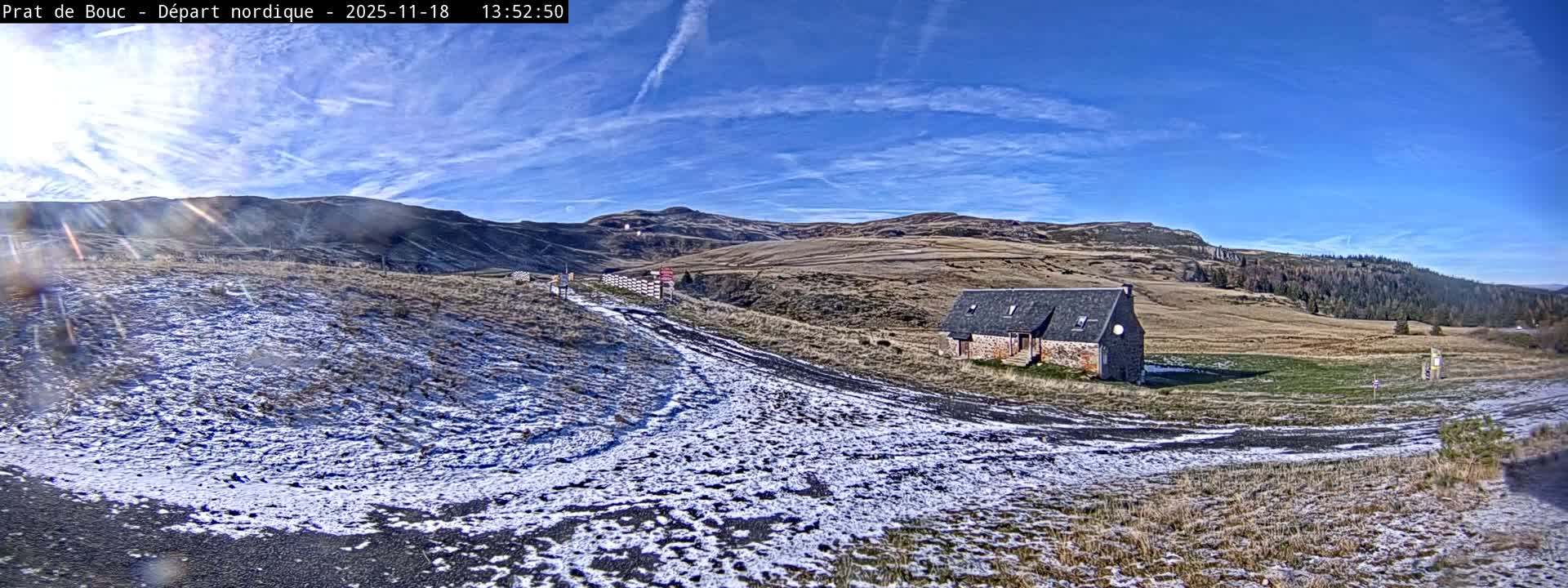 A blurry, nighttime image shows a dark, possibly snowy or foggy scene with indistinct shapes and varying shades of gray.