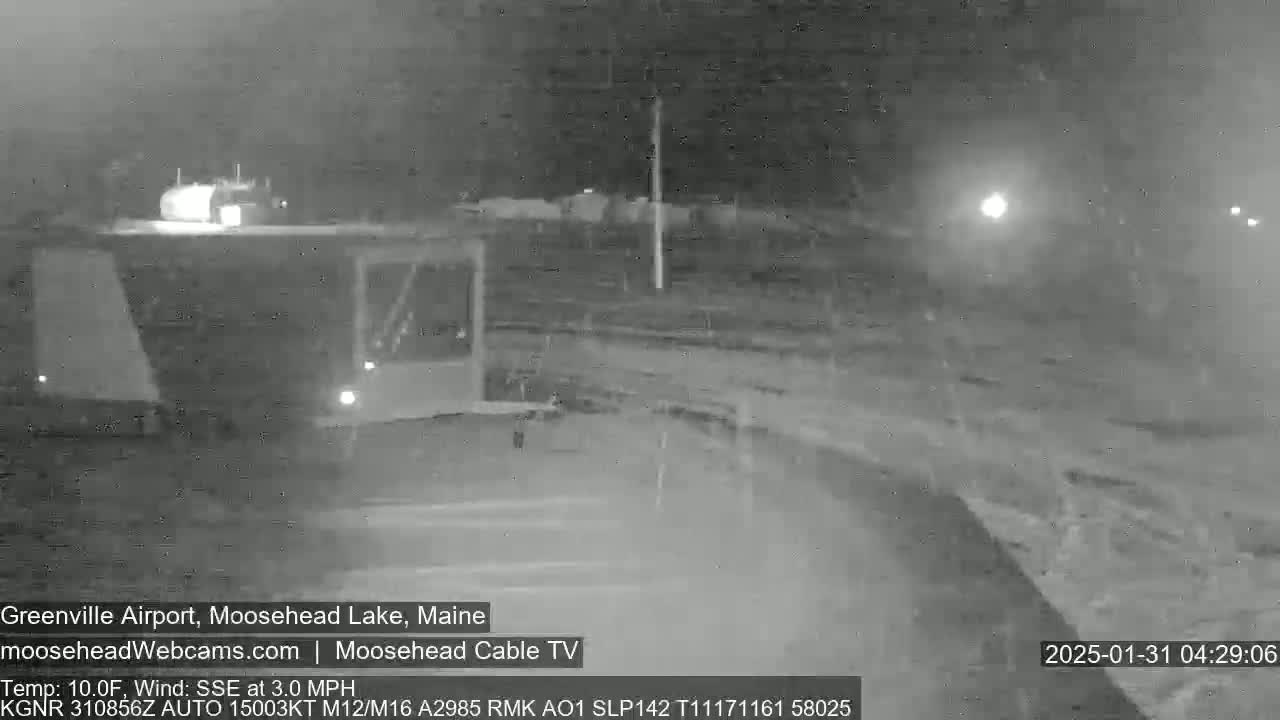 A nighttime, low-light view of a road and airport area with a slight wind from the SSE at 3 mph and a temperature of 10°F.