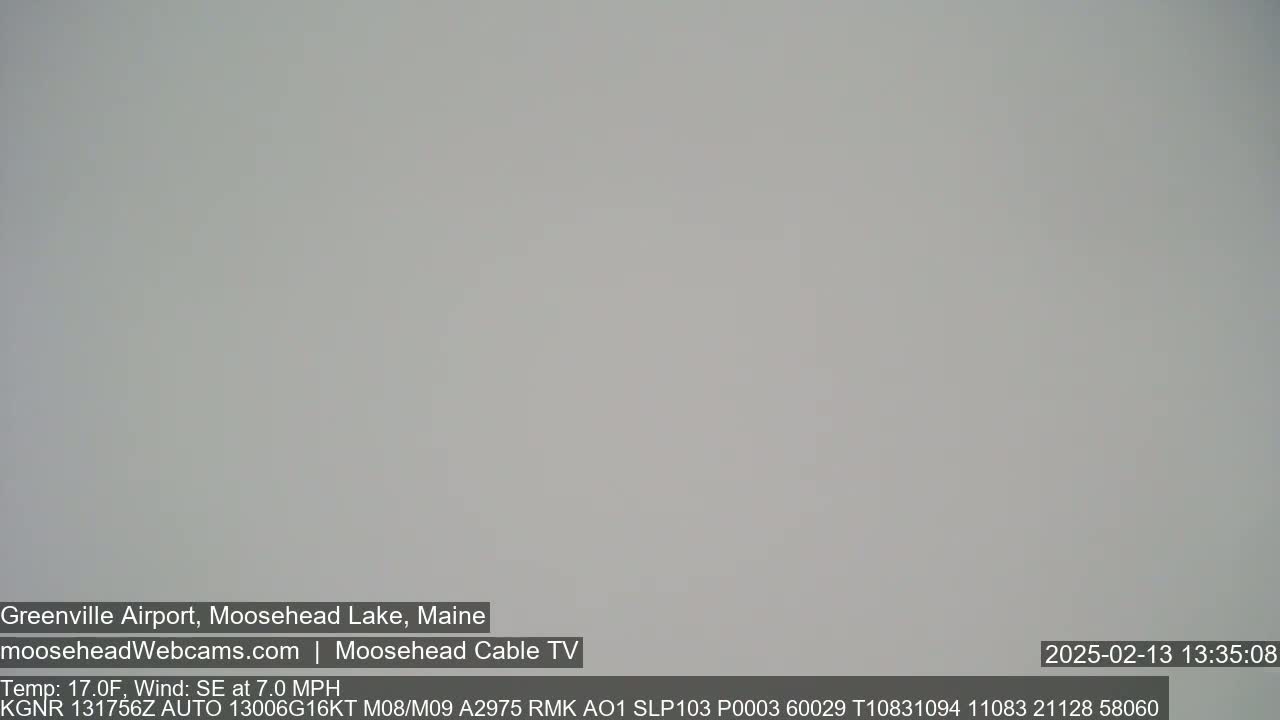 A mostly overcast, gray sky is visible.