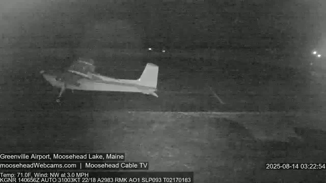 A small airplane is on a tarmac at night with a northwest wind at 3 mph and a temperature of 71 degrees Fahrenheit.